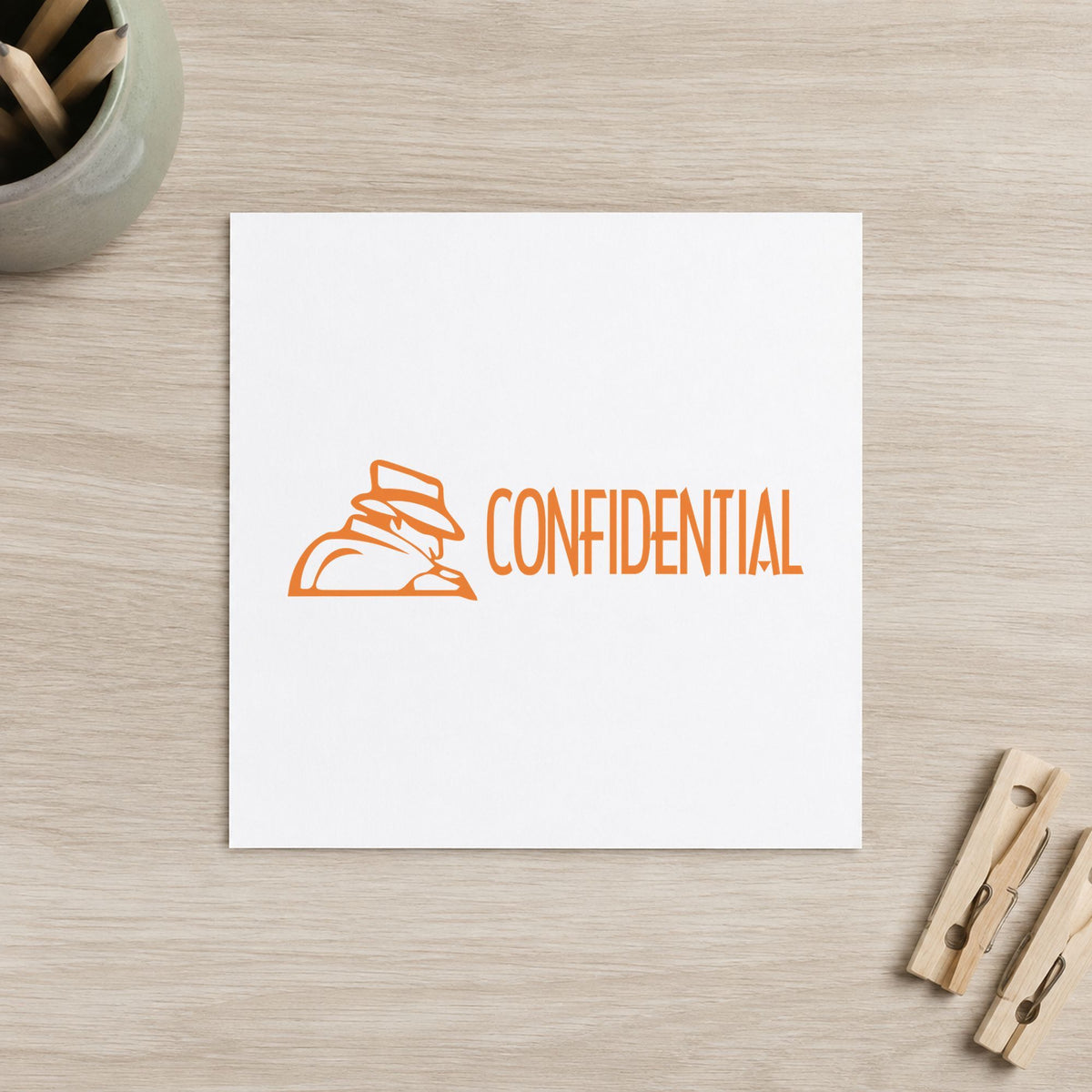 Marking a page "Confidential" with the Confidential Office Stamp – Figure Style Pre-Inked Xstamper