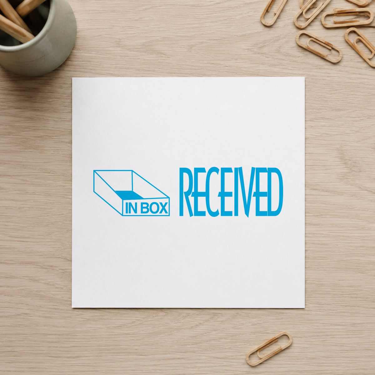 Received Stamp – Blue Pre-Inked Xstamper leaving a clean "Received" impression