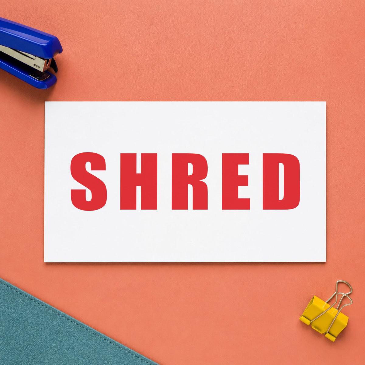 Marking a page "Shred" with the Shred Stamp
