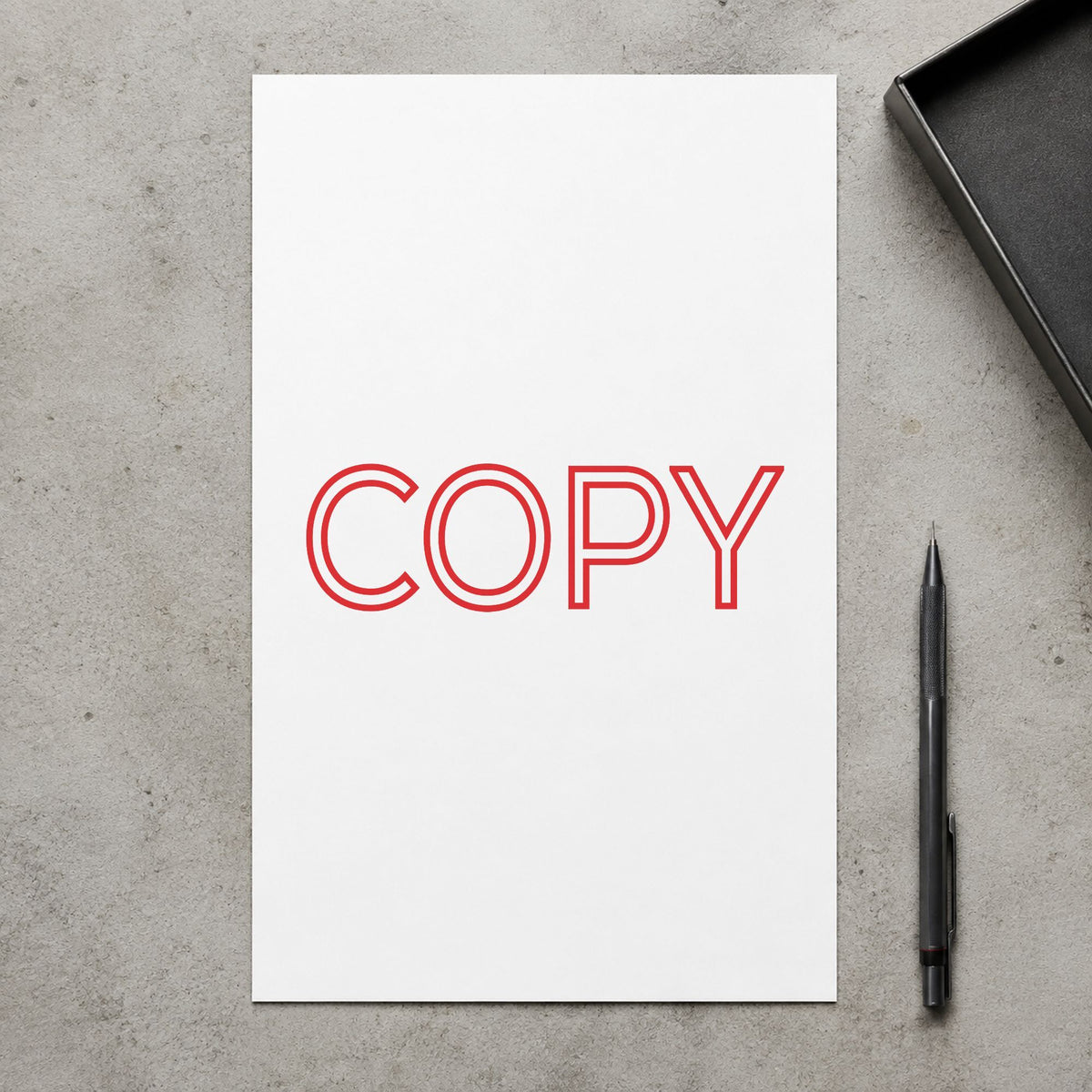 Marking a page "Copy" with the Jumbo Red Copy Stamp