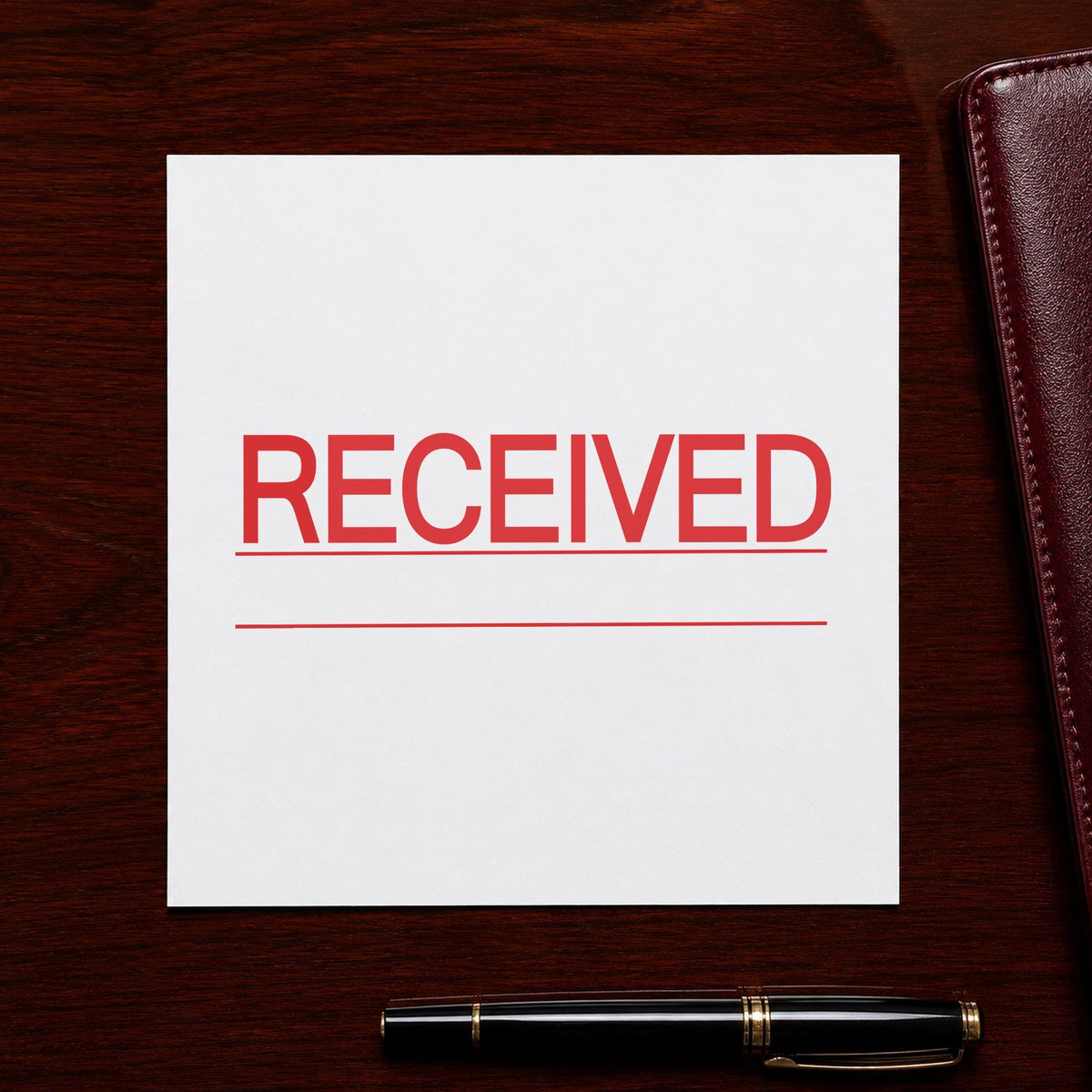 "Received" imprint stamped on a document with the Received Stamp For Document Intake – Jumbo Bold Red Pre-Inked Xstamper