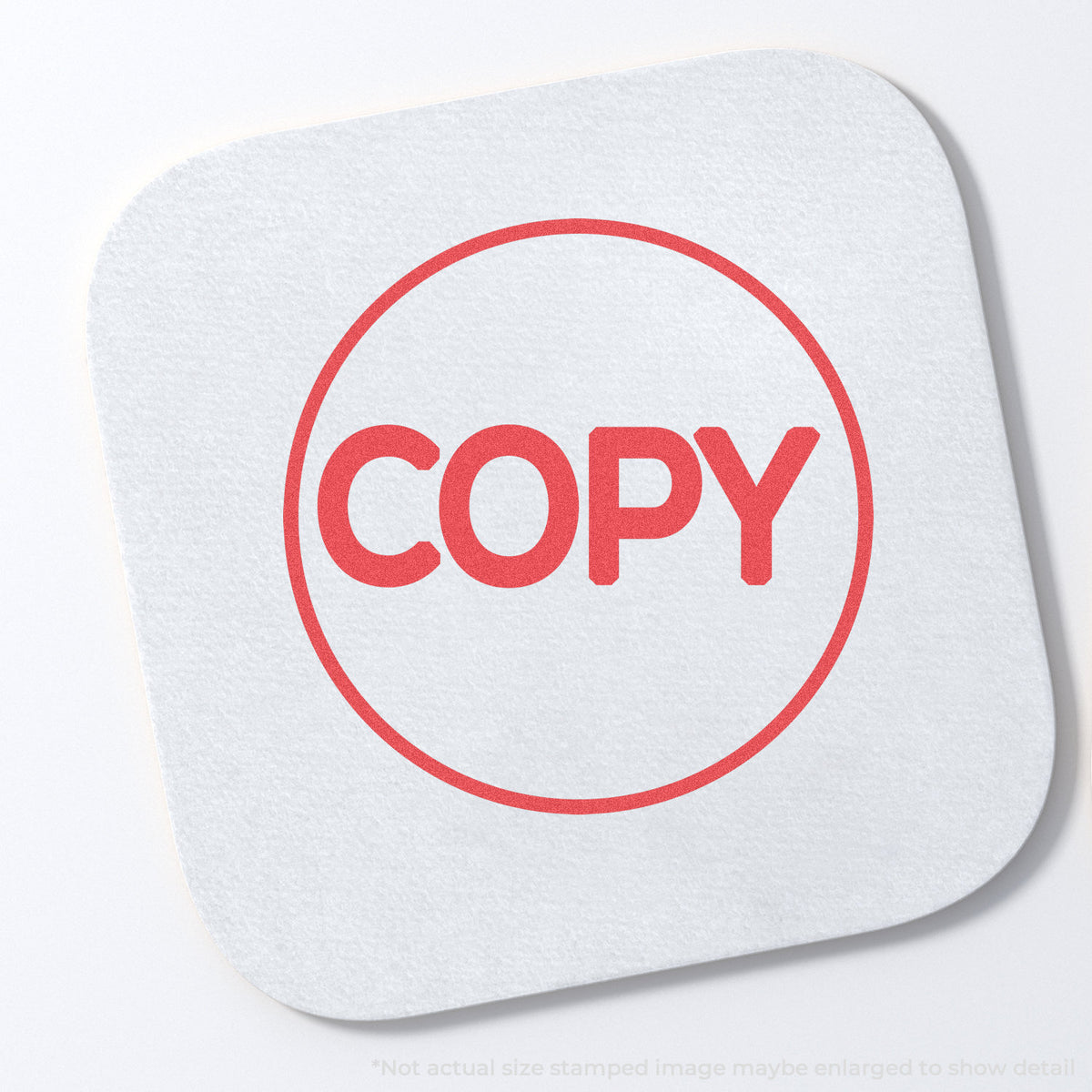 "Copy" stamp impression on light paper stock, Copy Stamp – Round Red Pre-Inked Xstamper