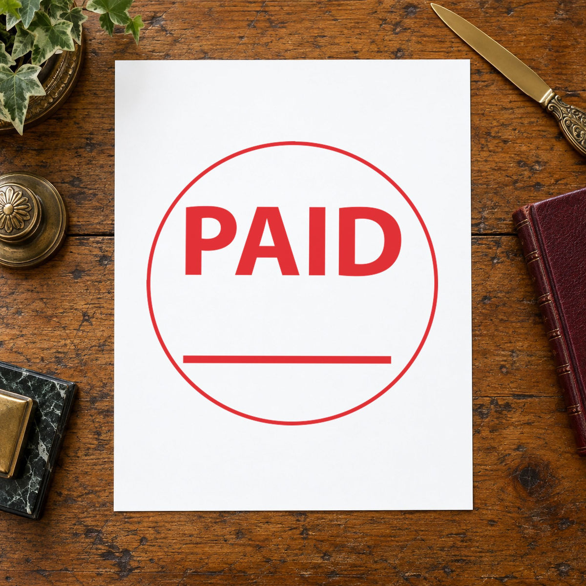 "Paid" mark added to paperwork with a pre-inked Xstamper stamp