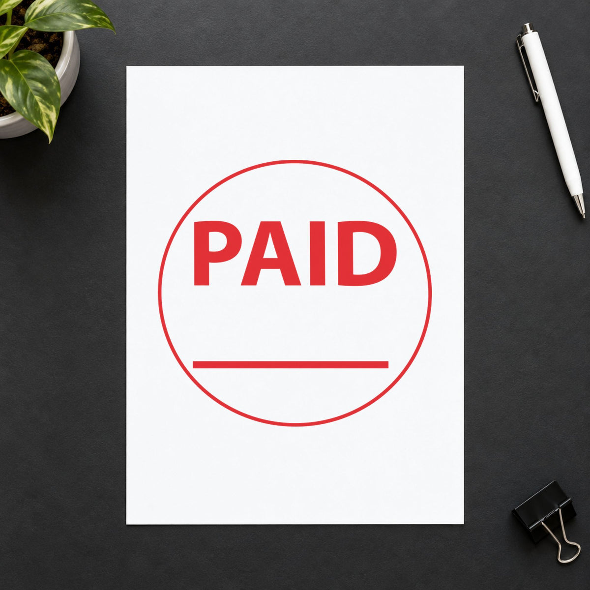 "Paid" stamp mark in everyday office use, Xstamper 11415