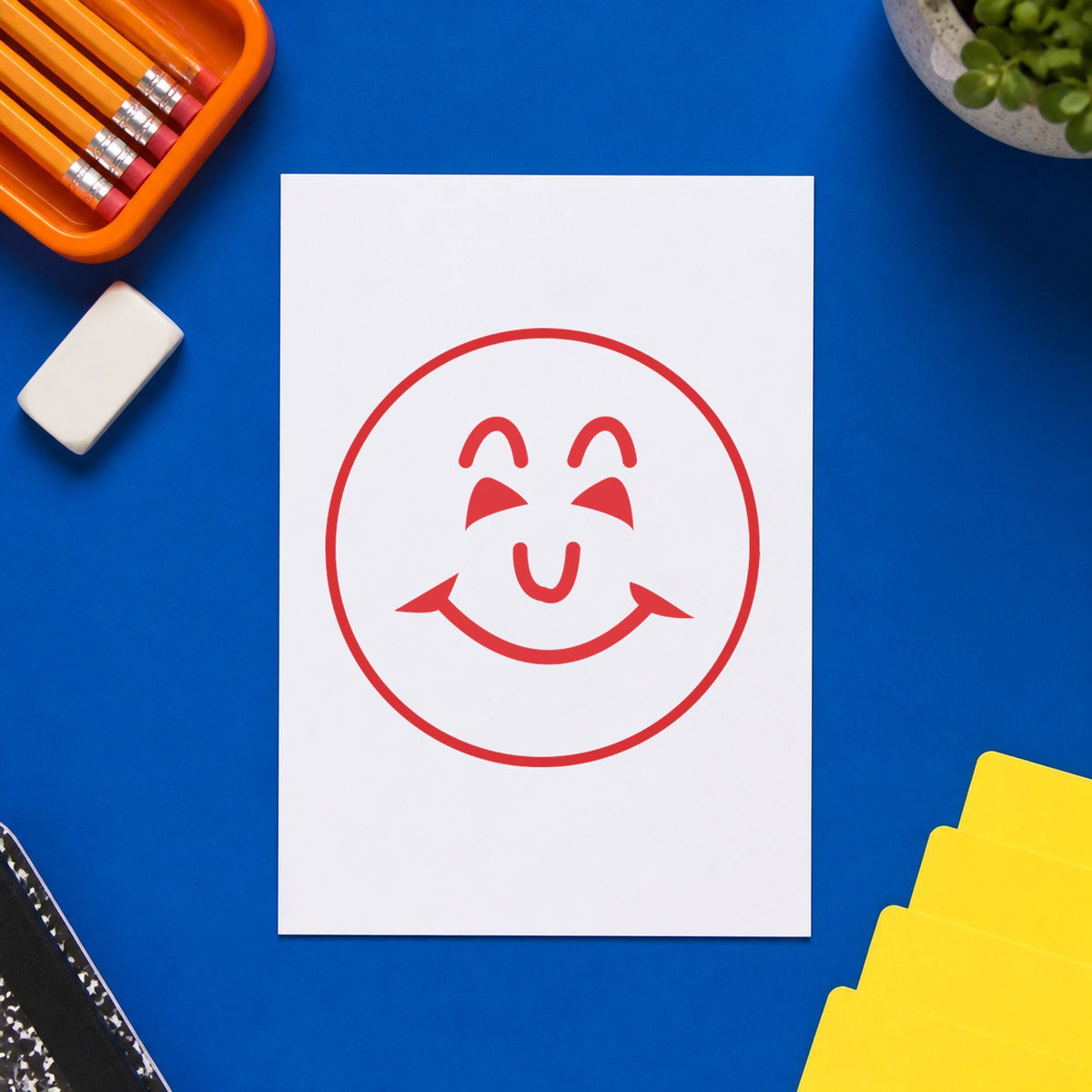 "Smiley face" impression shown close up, round imprint at 5/8 in diameter