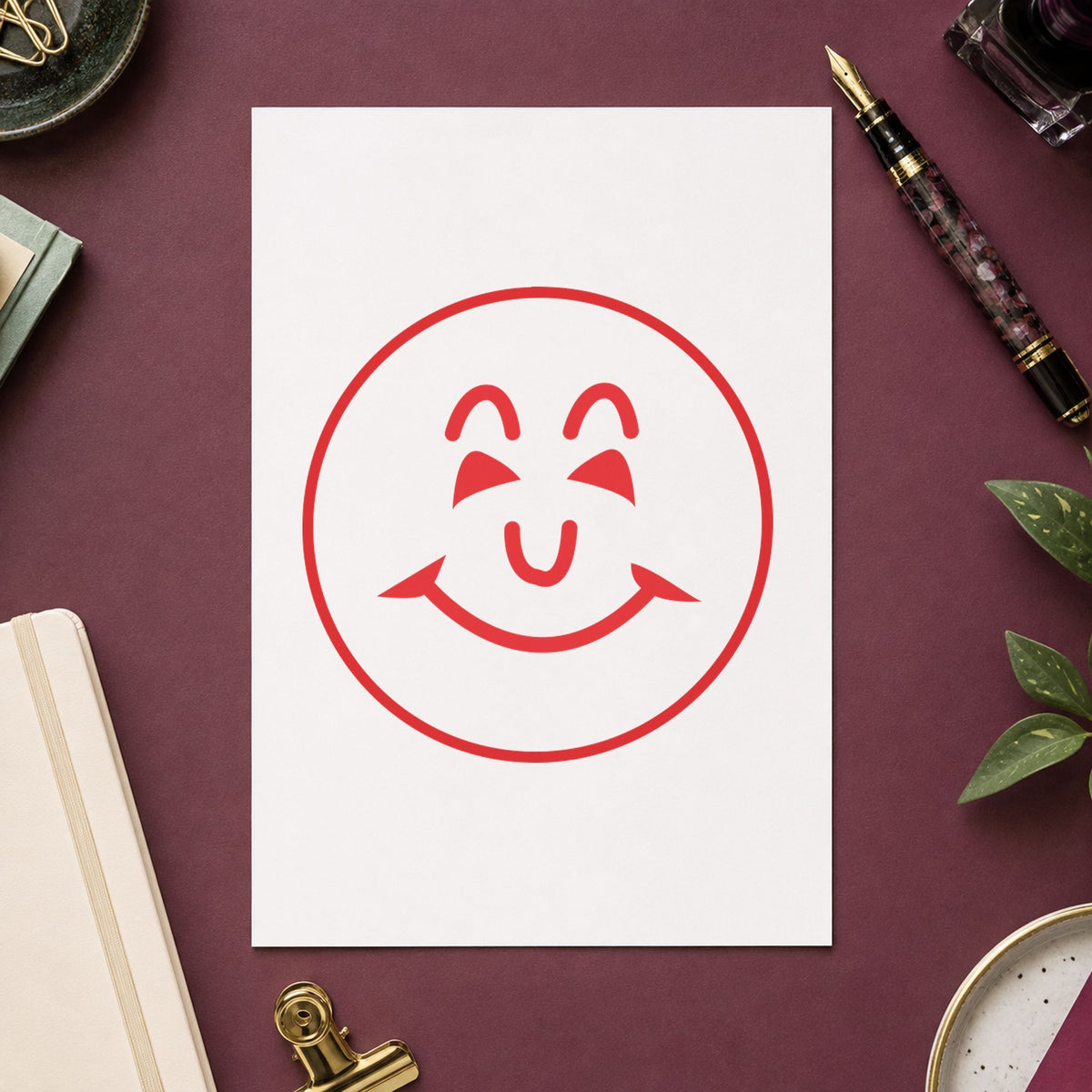 Marking a page "Smiley face" with the Round Red Smiley Face Teacher Stamp