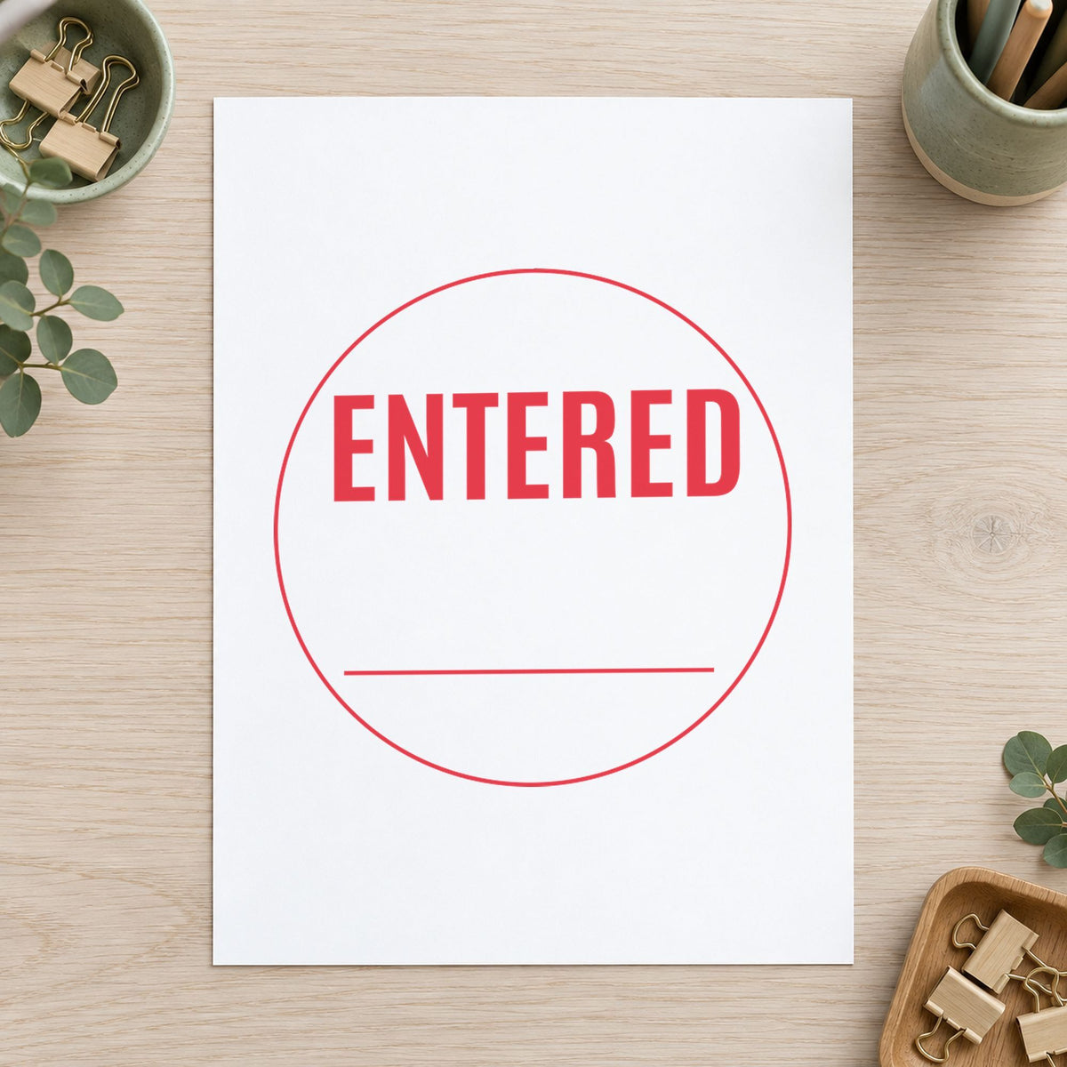 "Entered" imprint at 5/8 in diameter, no separate ink pad required