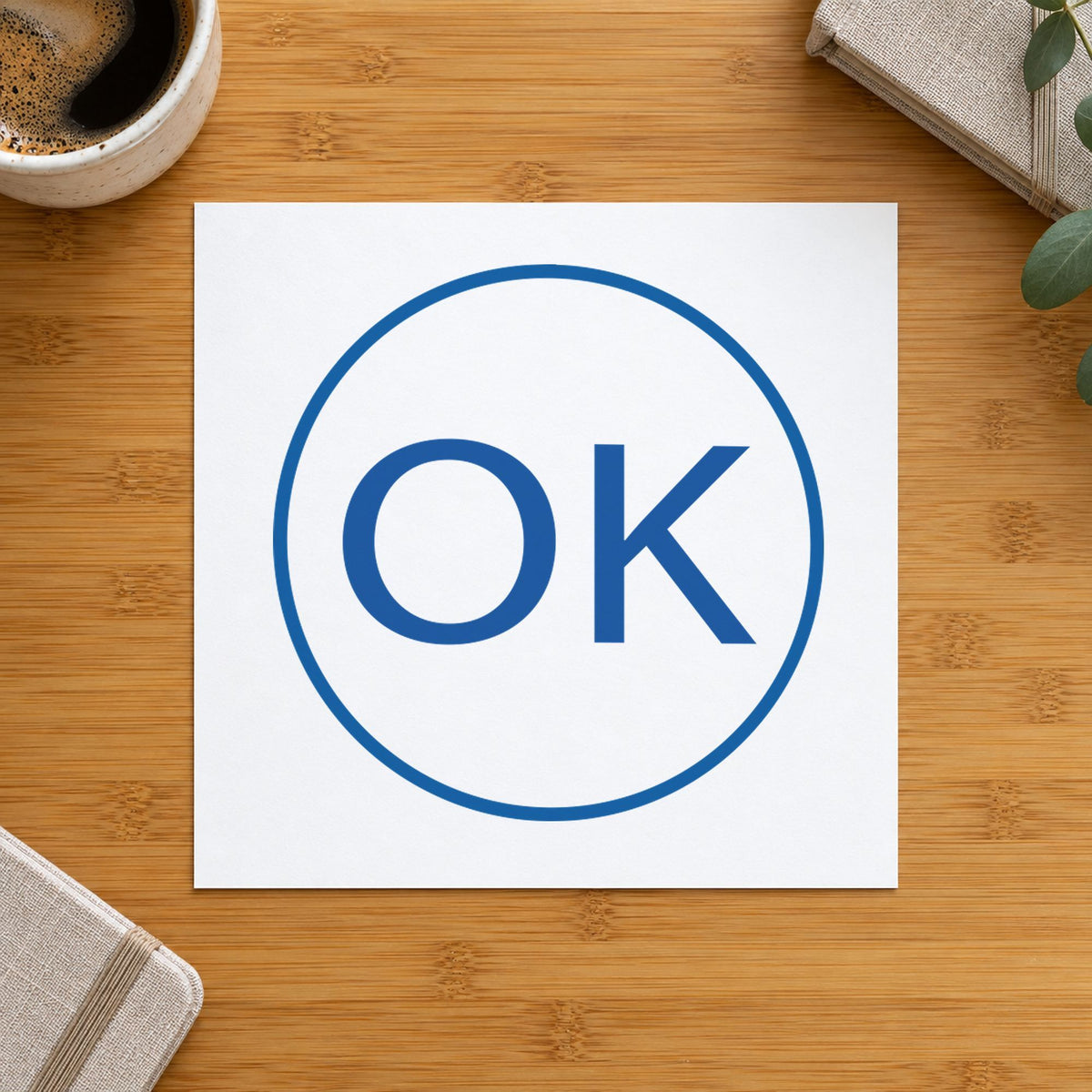 "OK" impression shown close up, round imprint at 5/8 in diameter