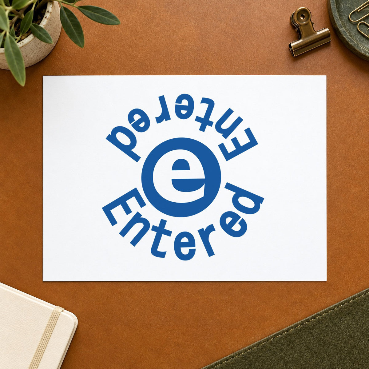 "Entered" imprint at 5/8 in diameter, no separate ink pad required