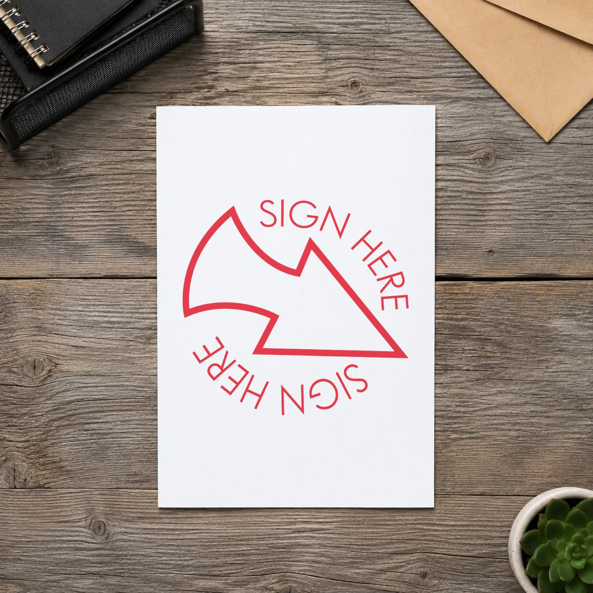 Marking a page "Sign here" with the Round Red Sign Here Stamp