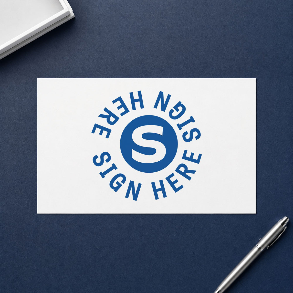 "Sign here" stamp impression made with pre-inked Xstamper 11424