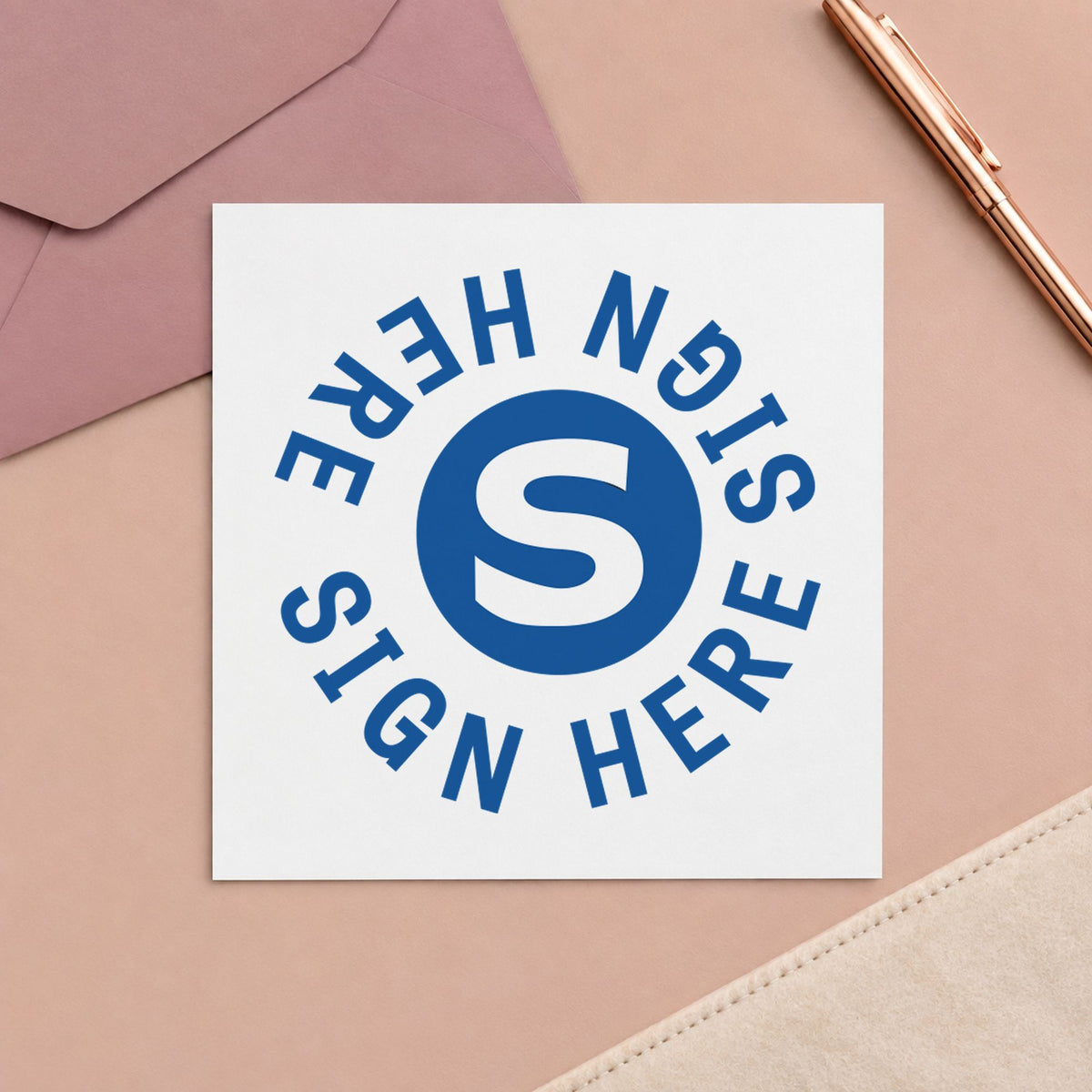 "Sign here" mark added to paperwork with a pre-inked Xstamper stamp