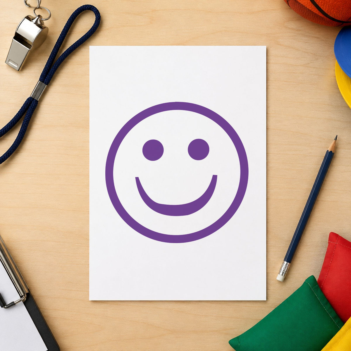 Xstamper Smiley Face Stamp – Round Violet Pre-Inked leaving a clean "Smiley face" impression