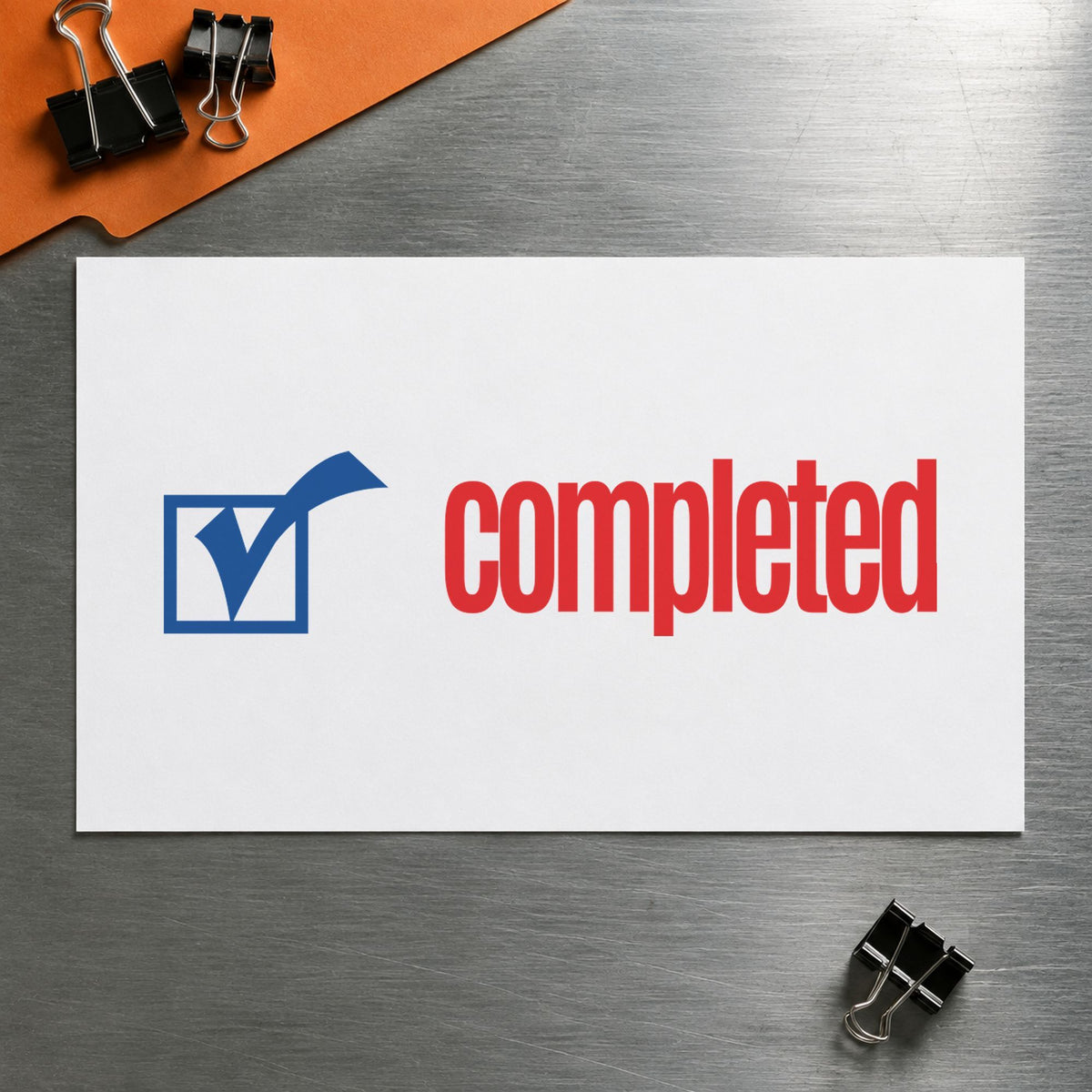"Completed" imprint stamped on a document with the Xstamper Completed Stamp