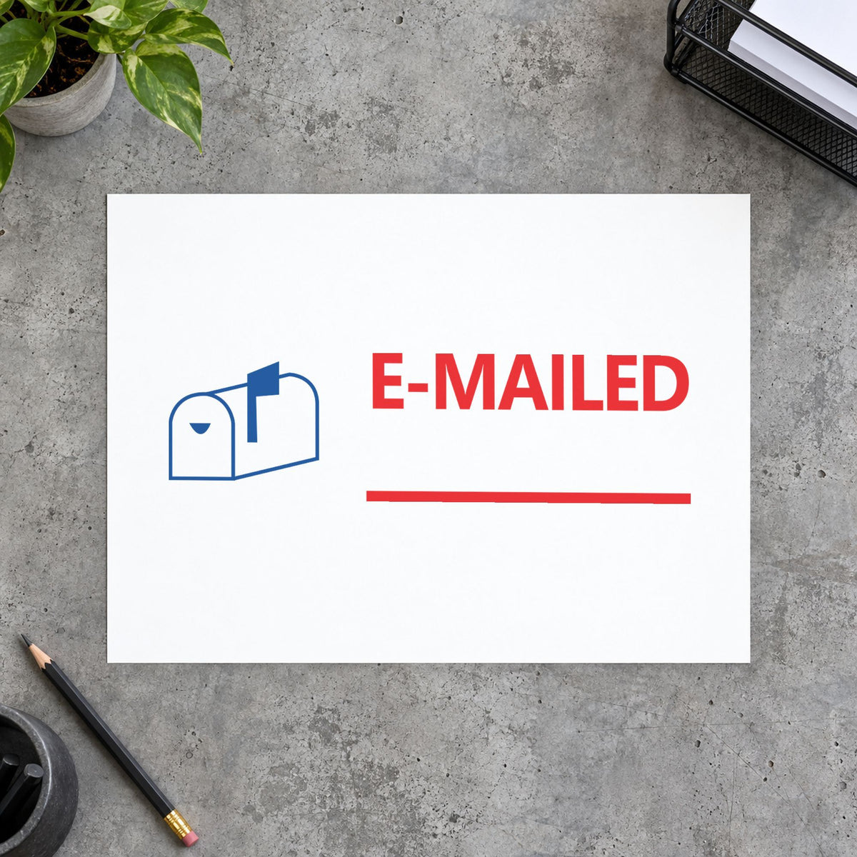 "Emailed" imprint stamped on a document with the Xstamper Emailed Office Stamp
