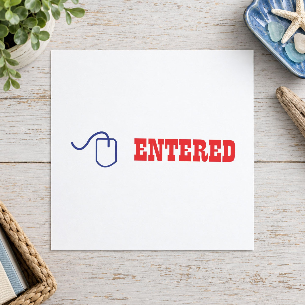"Entered" stamp impression made with pre-inked Xstamper 2027