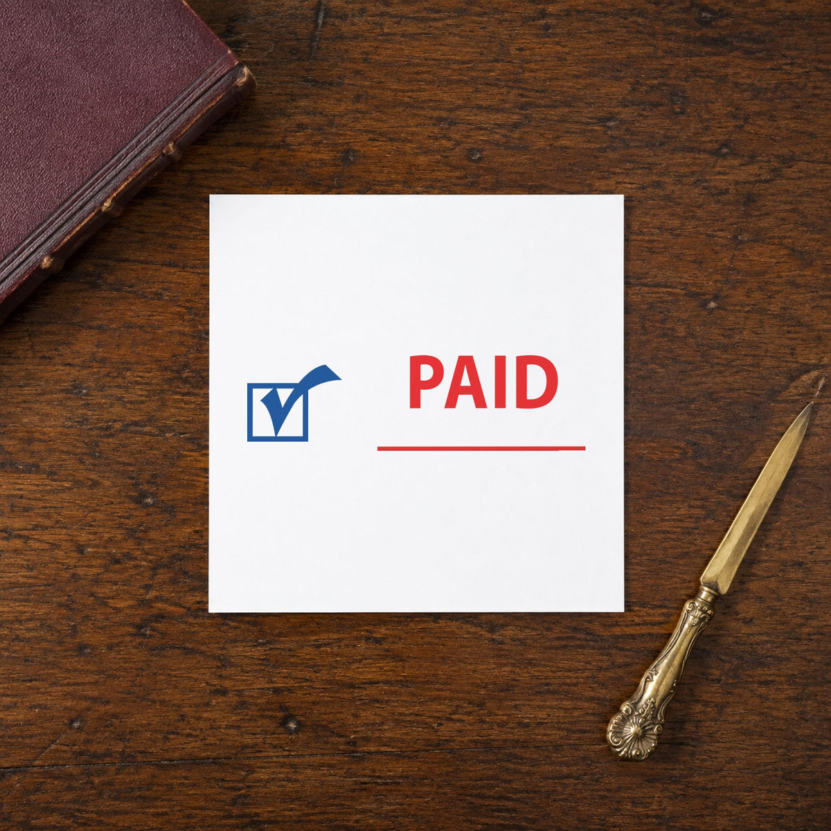 "Paid" imprint at 1/2 x 1-5/8 in, no separate ink pad required