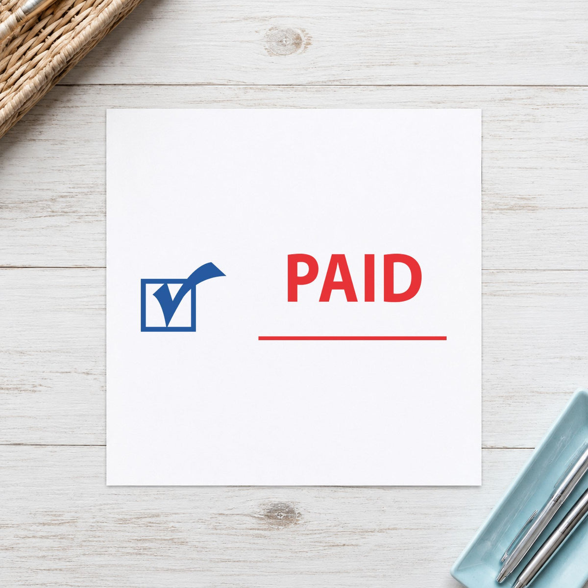 Marking a page "Paid" with the Two-Color Paid Stamp