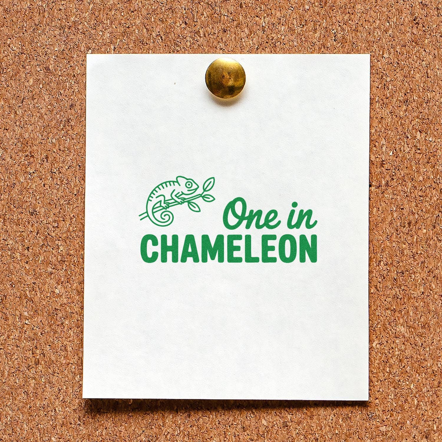 One in a Chameleon rubber stamp with green chameleon graphic, displayed on pinned paper for custom novelty stamping.