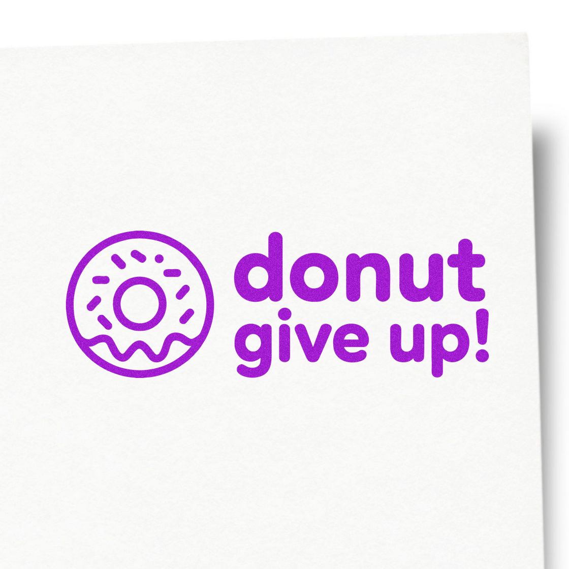 Funny donut give up rubber stamp design with donut icon and motivational pun text for bakeries and stationery.