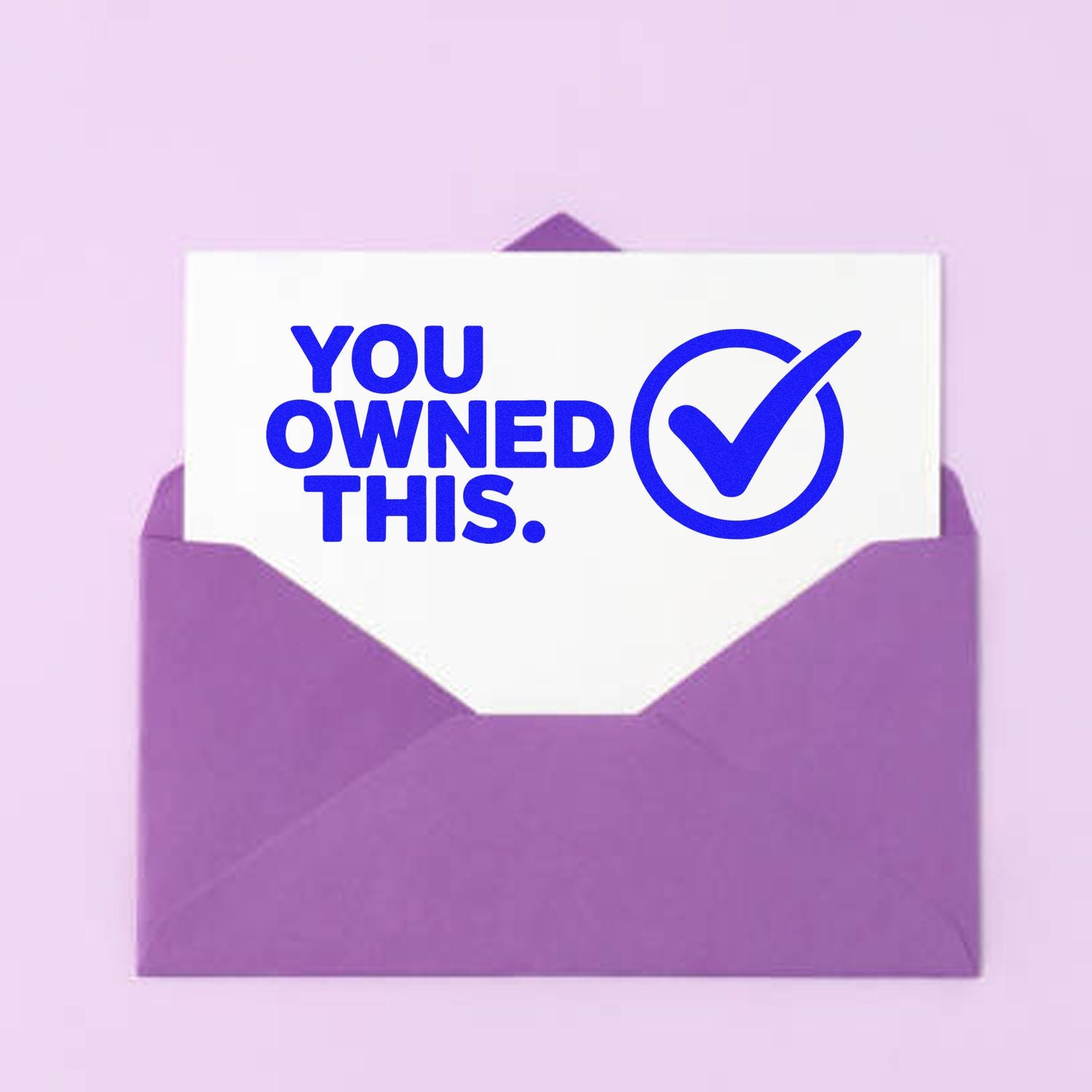 You Owned This rubber stamp design with blue checkmark on a card in a purple envelope.