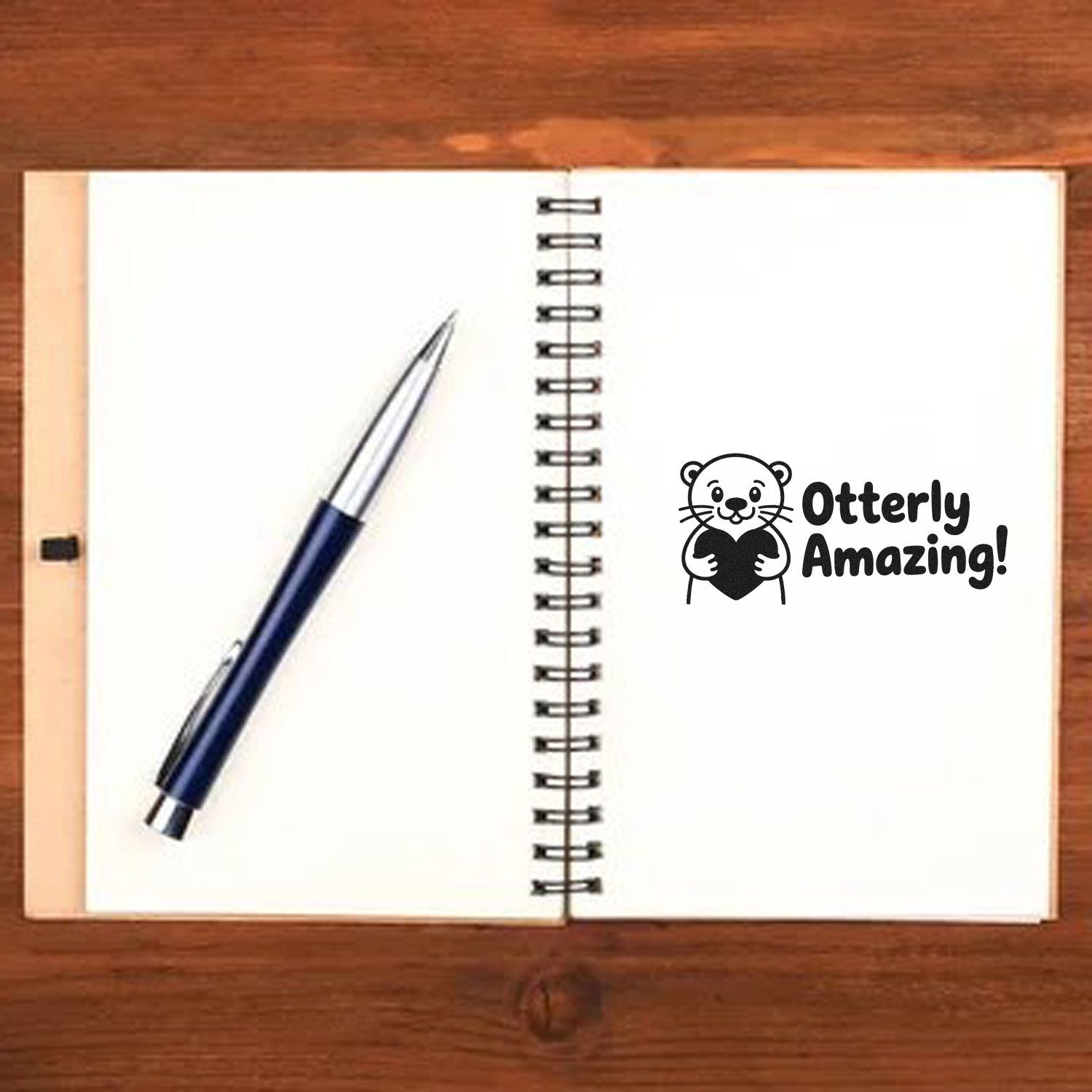 Otterly Amazing rubber stamp design with cute otter holding a heart for journals, notebooks, and craft projects.