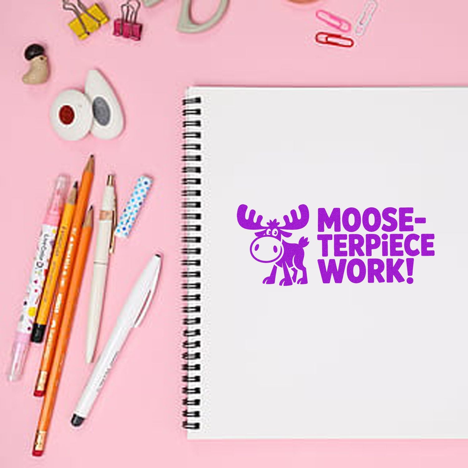 Moose-terpiece Work rubber stamp on notebook, a playful office stamp for teachers, planners, and stationery projects.