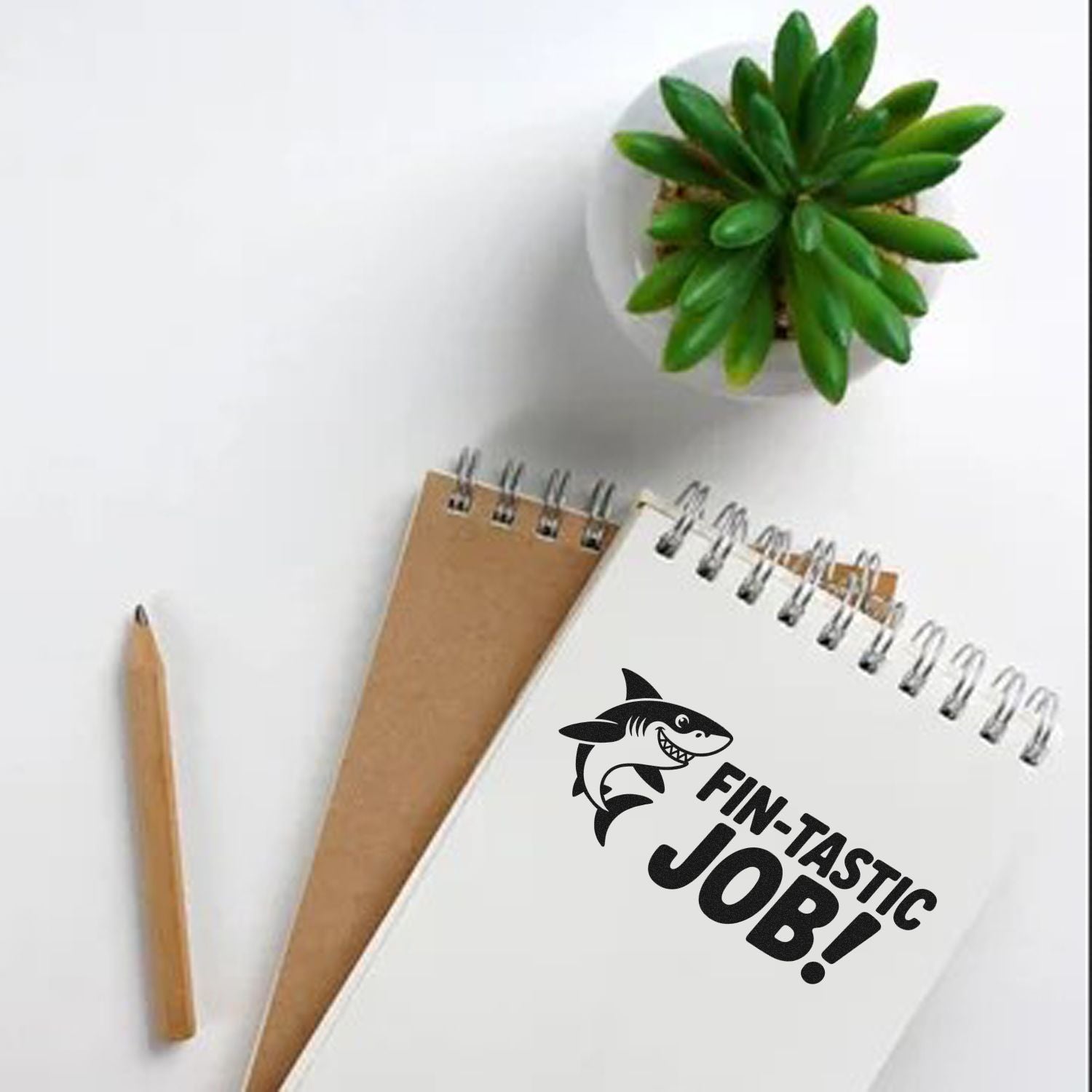 Shark Fin-Tastic Job! custom rubber stamp on notebook, perfect for teacher grading, school feedback, and reward stamps.