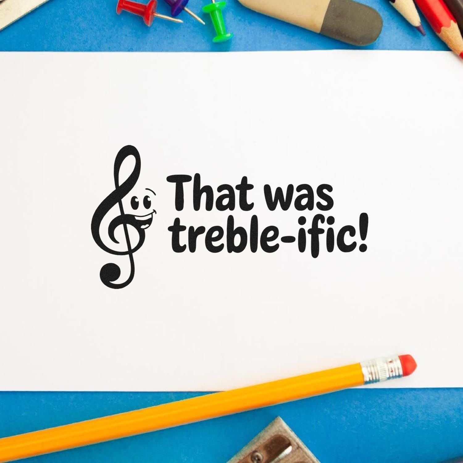 Music-themed rubber stamp impression reading That was treble-ific! with treble clef design for teachers and crafters