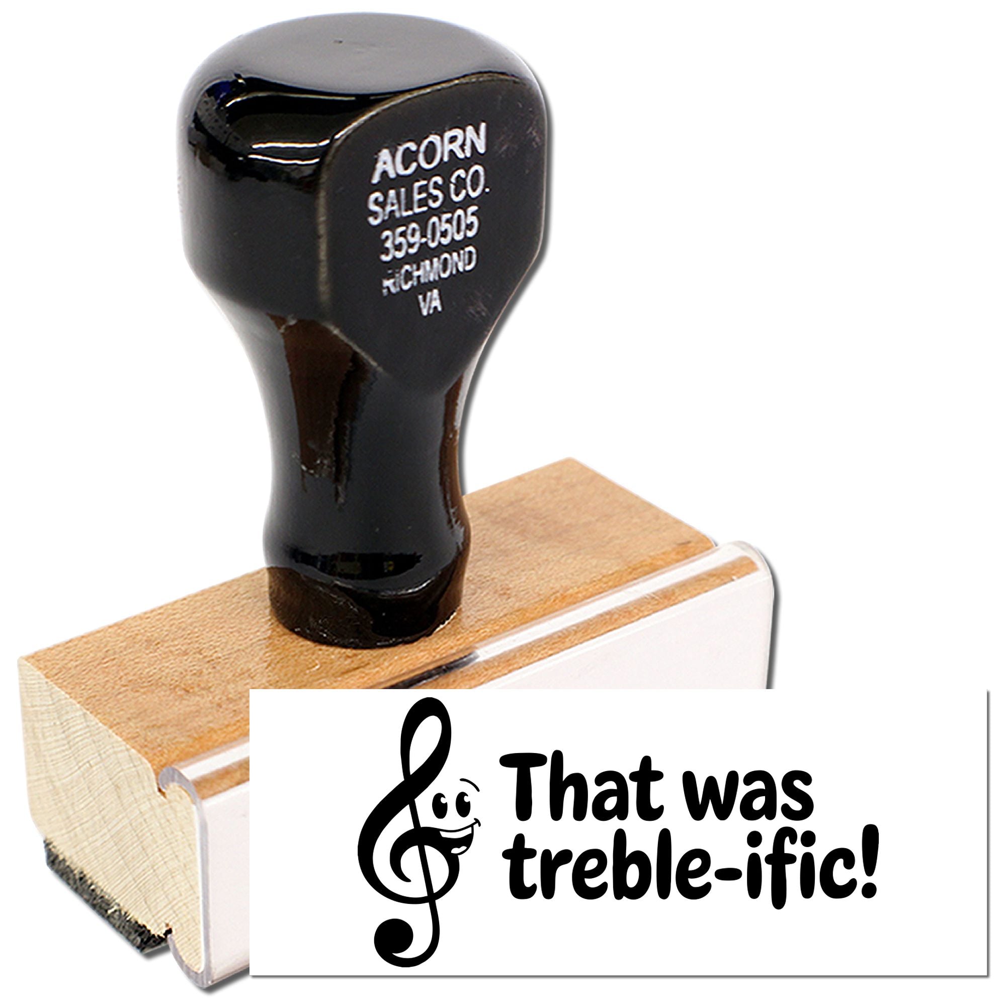 Custom wooden rubber stamp with treble clef design and That was treble-ific! music teacher message.