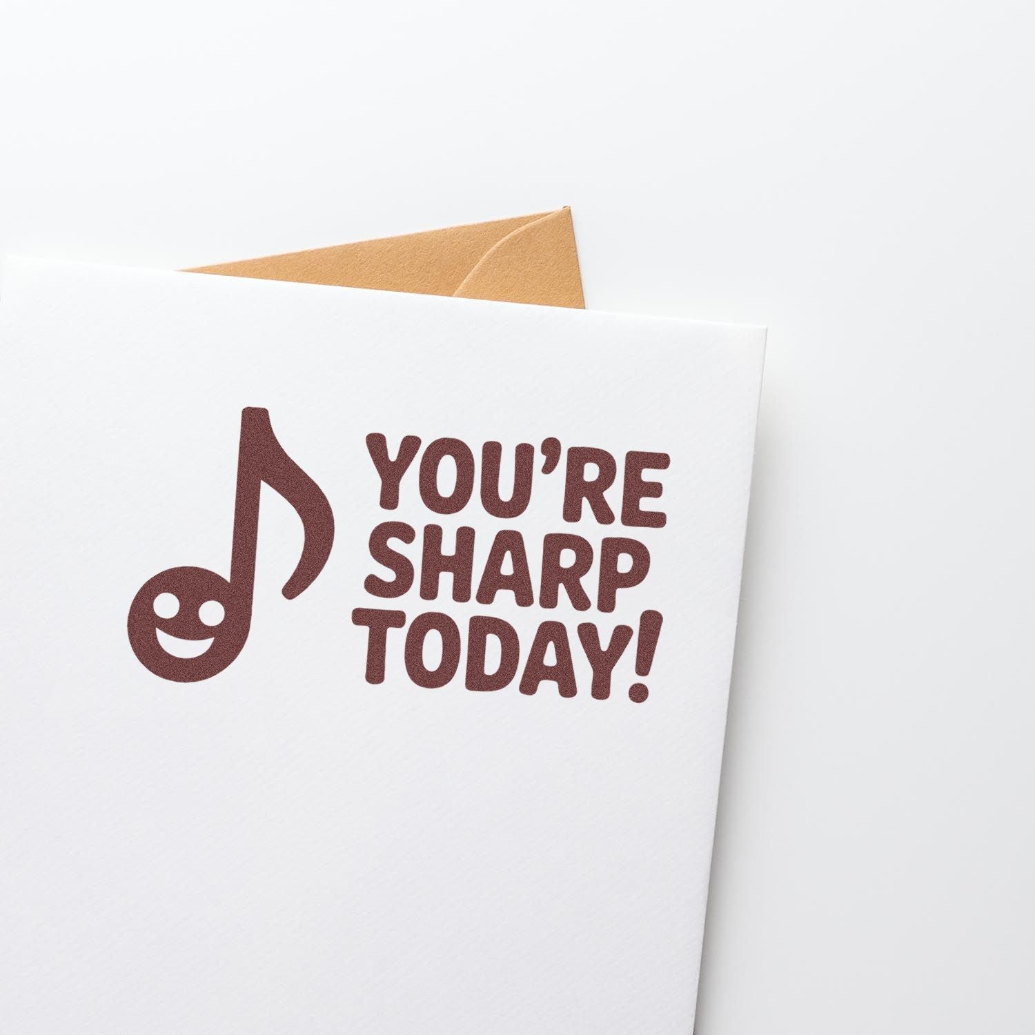 Funny Youre Sharp Today! rubber stamp design with smiley music note on a greeting card.