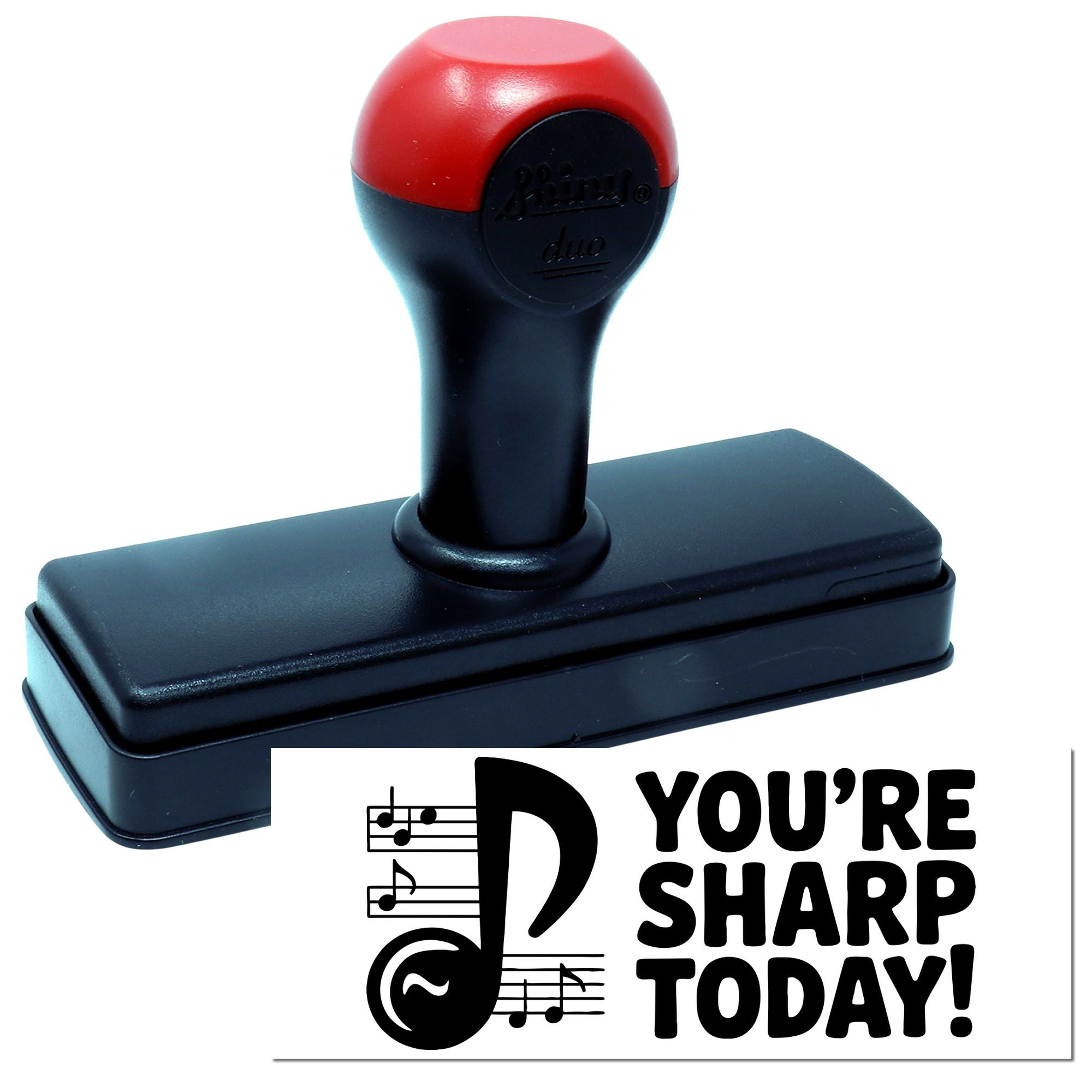 Music-themed self-inking rubber stamp with custom Youre Sharp Today! imprint for classroom or office grading.