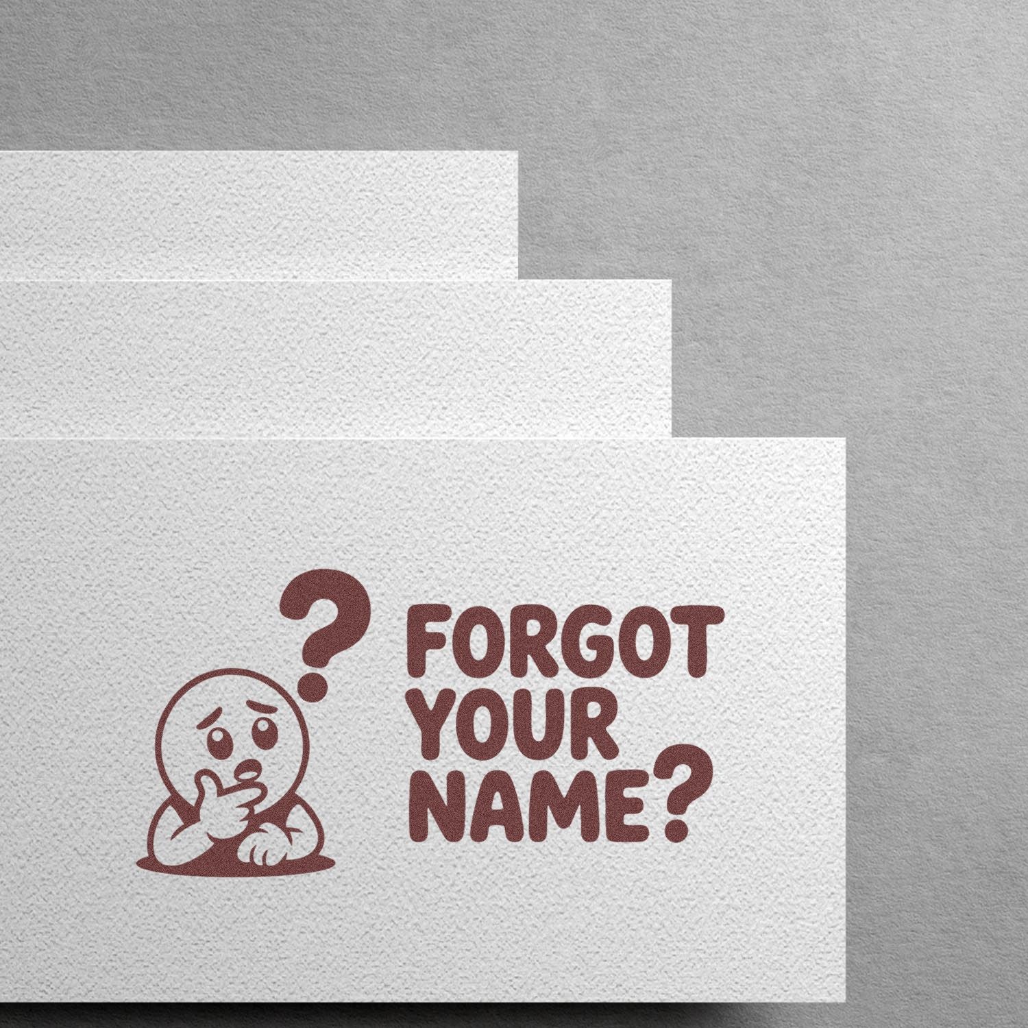 Funny custom rubber stamp design reading Forgot Your Name? with a confused face icon for office or event use.