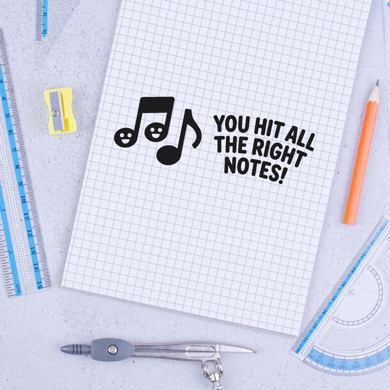 Music note rubber stamp design with You Hit All the Right Notes! for teacher praise, student rewards, and grading.