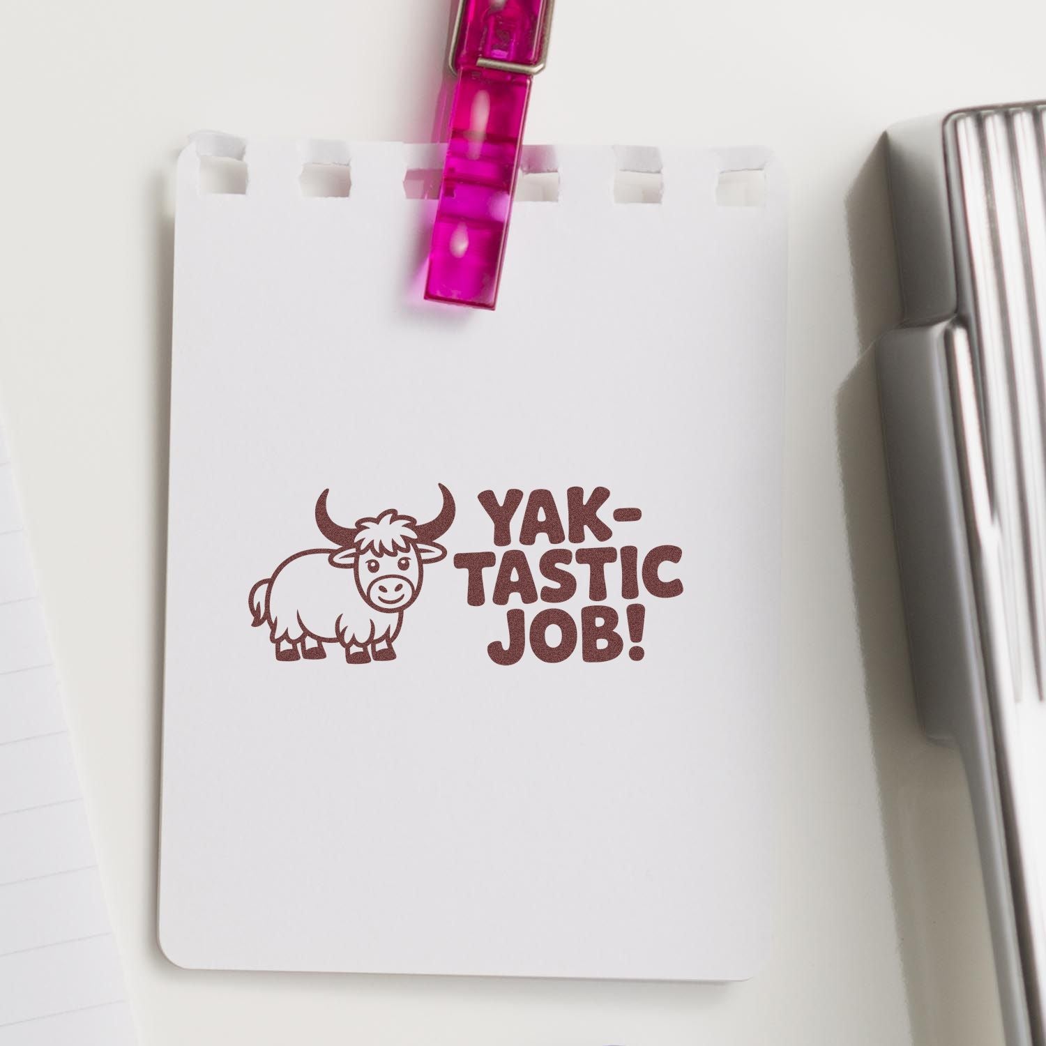 Yak-tastic Job rubber stamp with cartoon yak on notepad, a fun reward stamp for teachers, offices, and crafts.