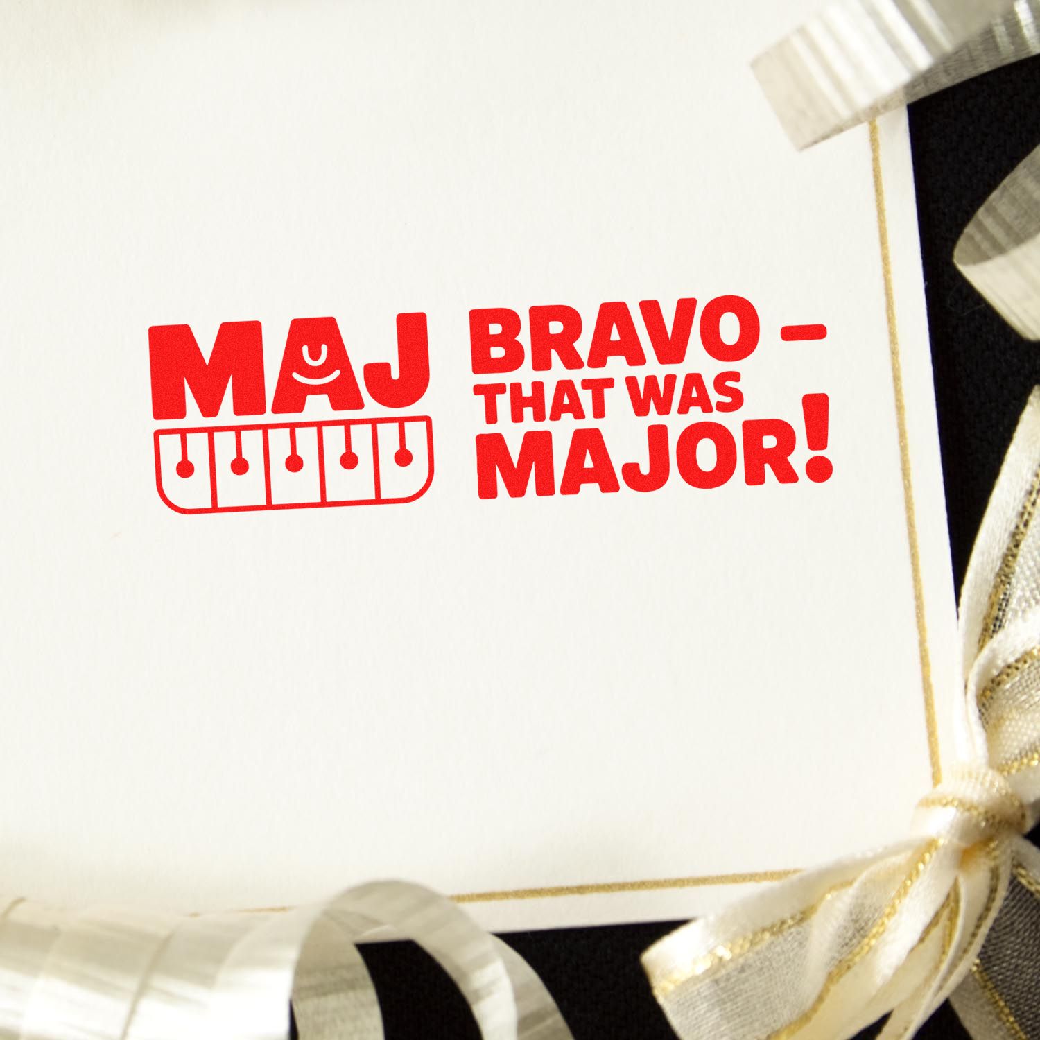 Red rubber stamp design reading Maj Bravo, That Was Major! on a card, ideal for graduation, military, or celebration notes.