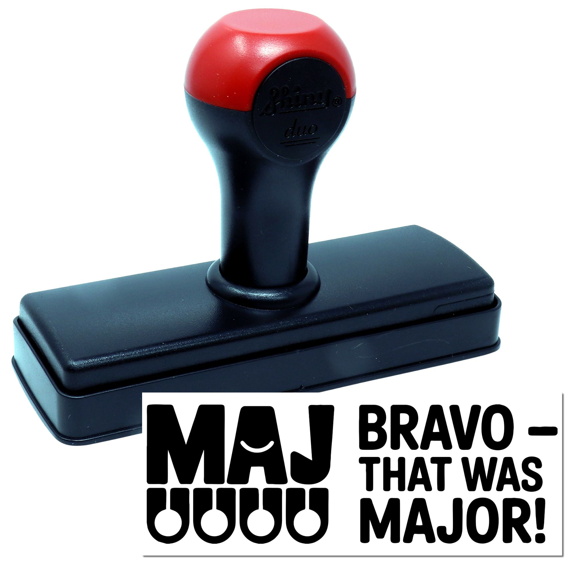 Self-inking rubber stamp showing Bravo That Was Major! imprint for praise, rewards, and office recognition.