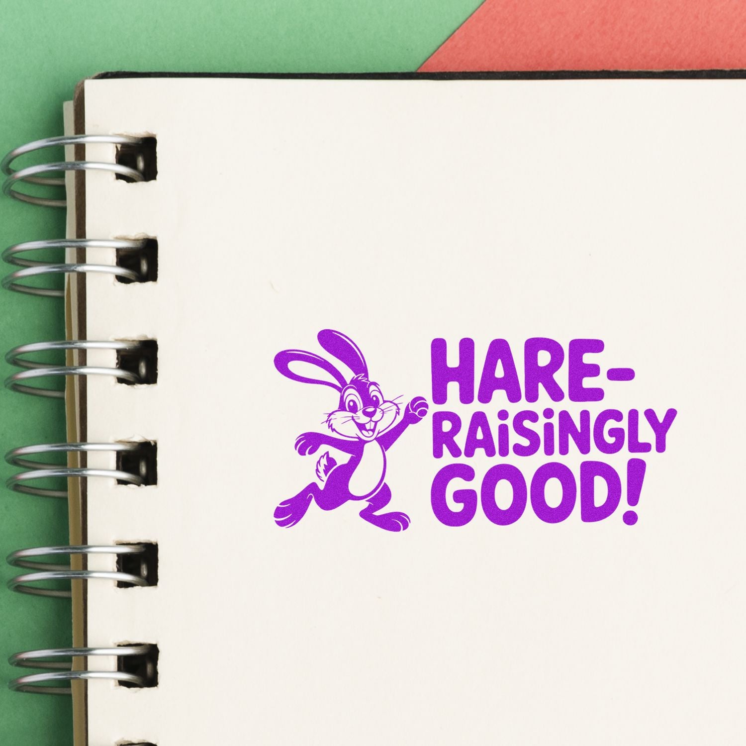 Purple bunny Hare-Raisingly Good! rubber stamp on notebook page, perfect for playful crafts and custom stationery.