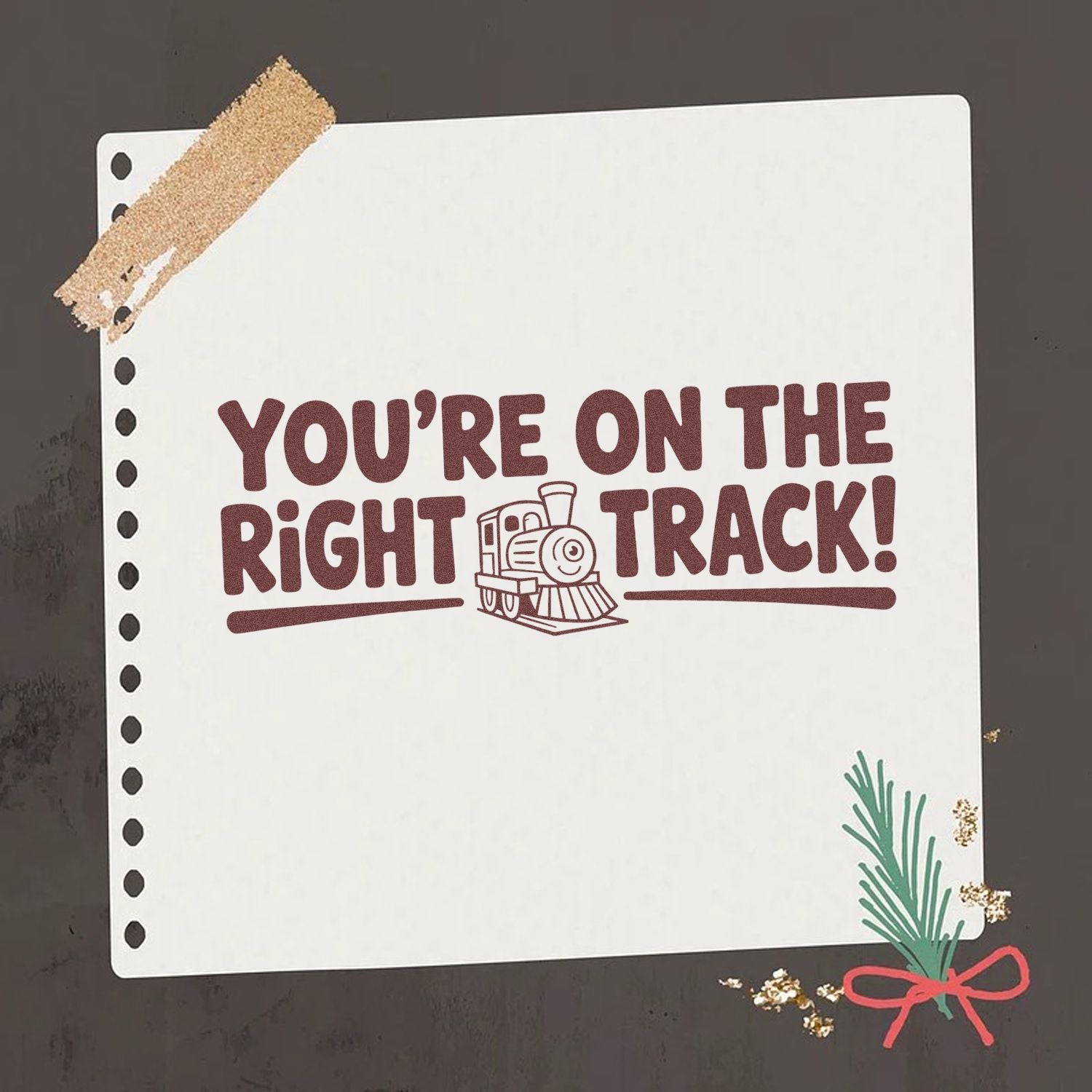Train rubber stamp with Youre on the right track! message on notebook paper for teacher encouragement and crafts.