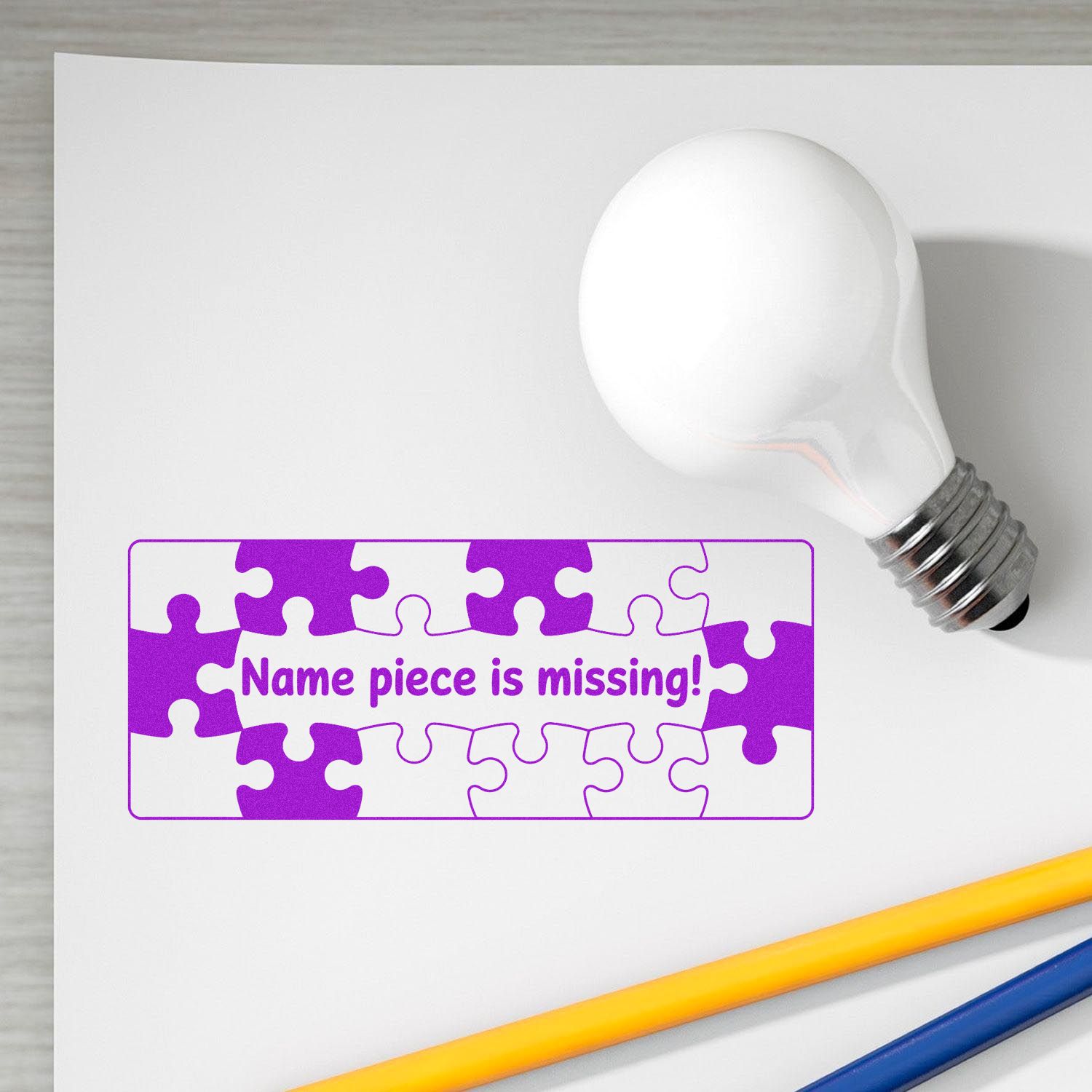 Custom rubber stamp with puzzle-piece Name piece is missing! design for classroom name labeling and school use.
