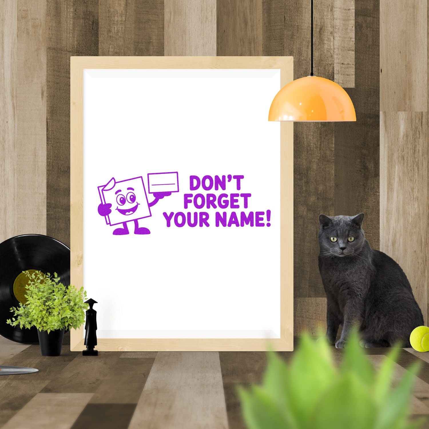 Purple rubber stamp mockup reading Dont Forget Your Name! for personalized name labeling and school supplies.