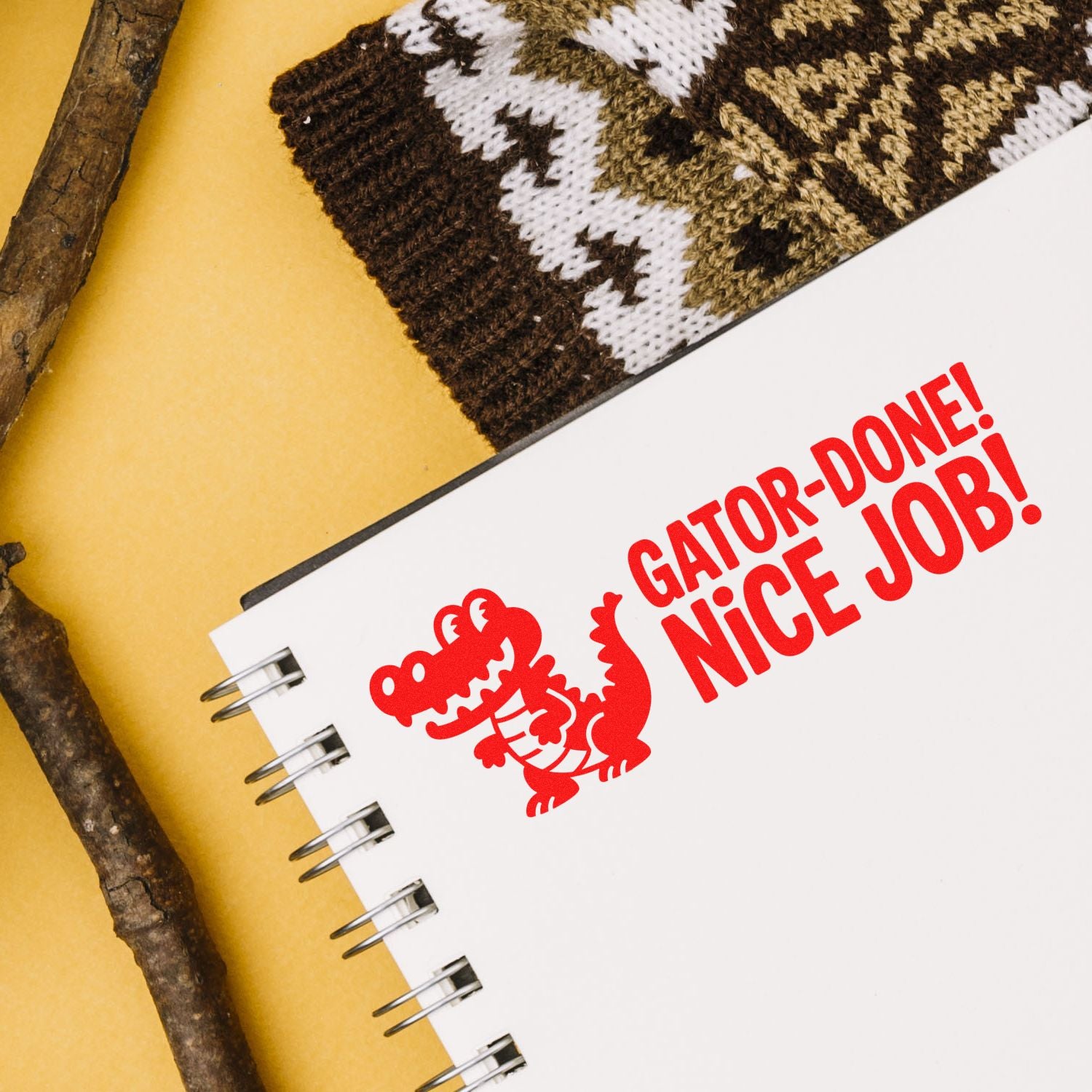 Red alligator rubber stamp with Gator-Done! Nice Job! on a notebook, ideal for fun reward stamping.