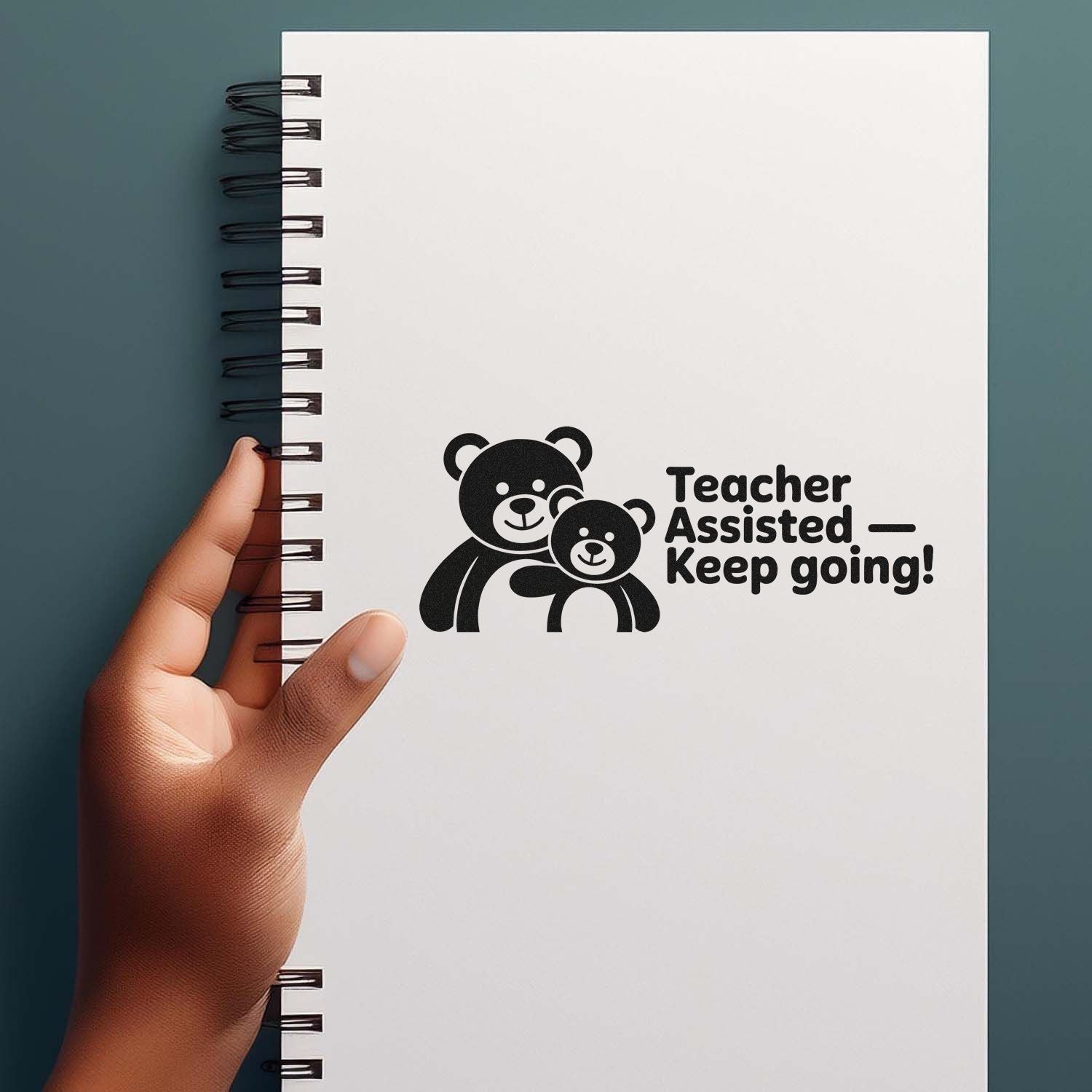 Rubber stamp on notebook with bears and Teacher AssistedKeep going! for classroom encouragement and student motivation.