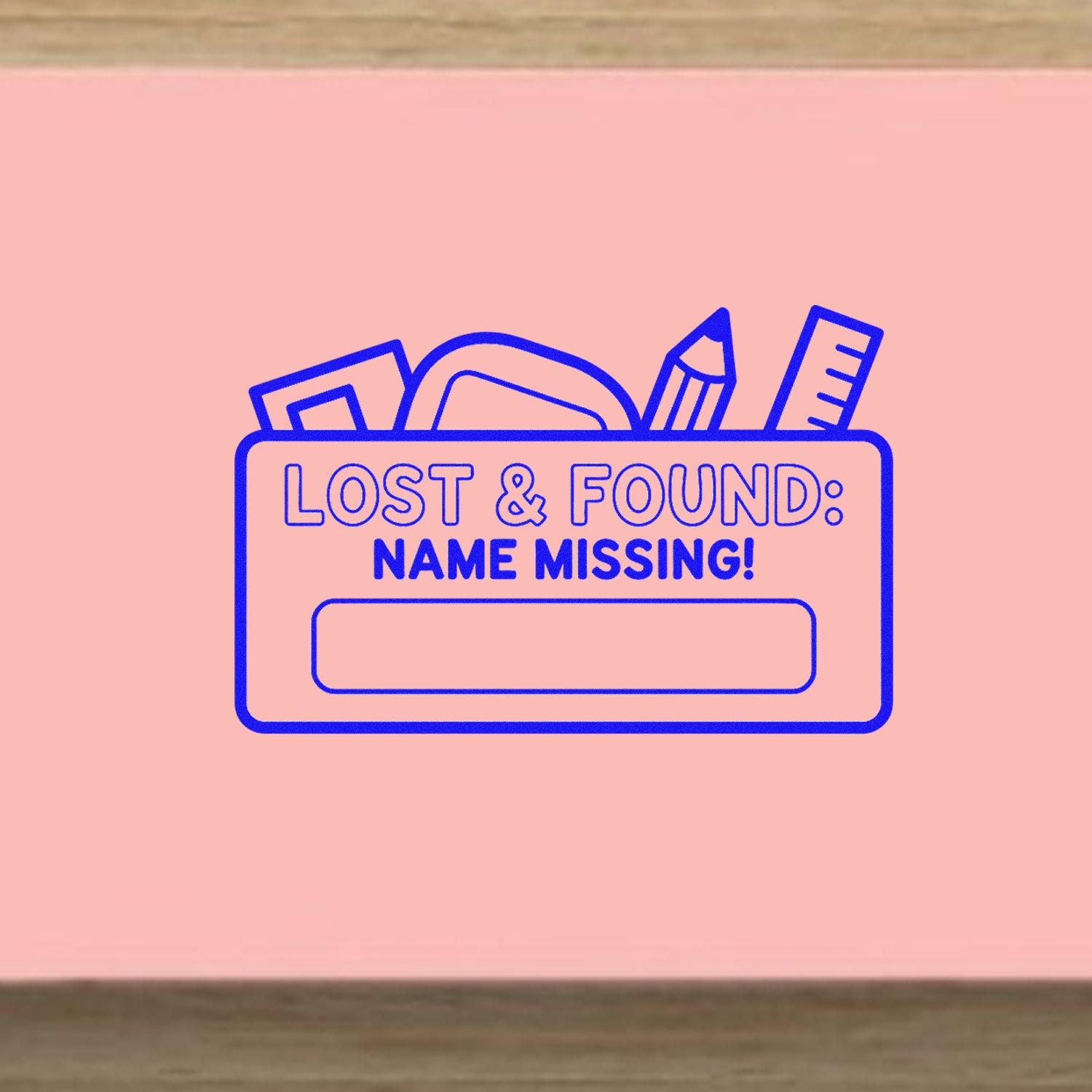 Lost and found rubber stamp with Name Missing label and blank space for personal item identification.