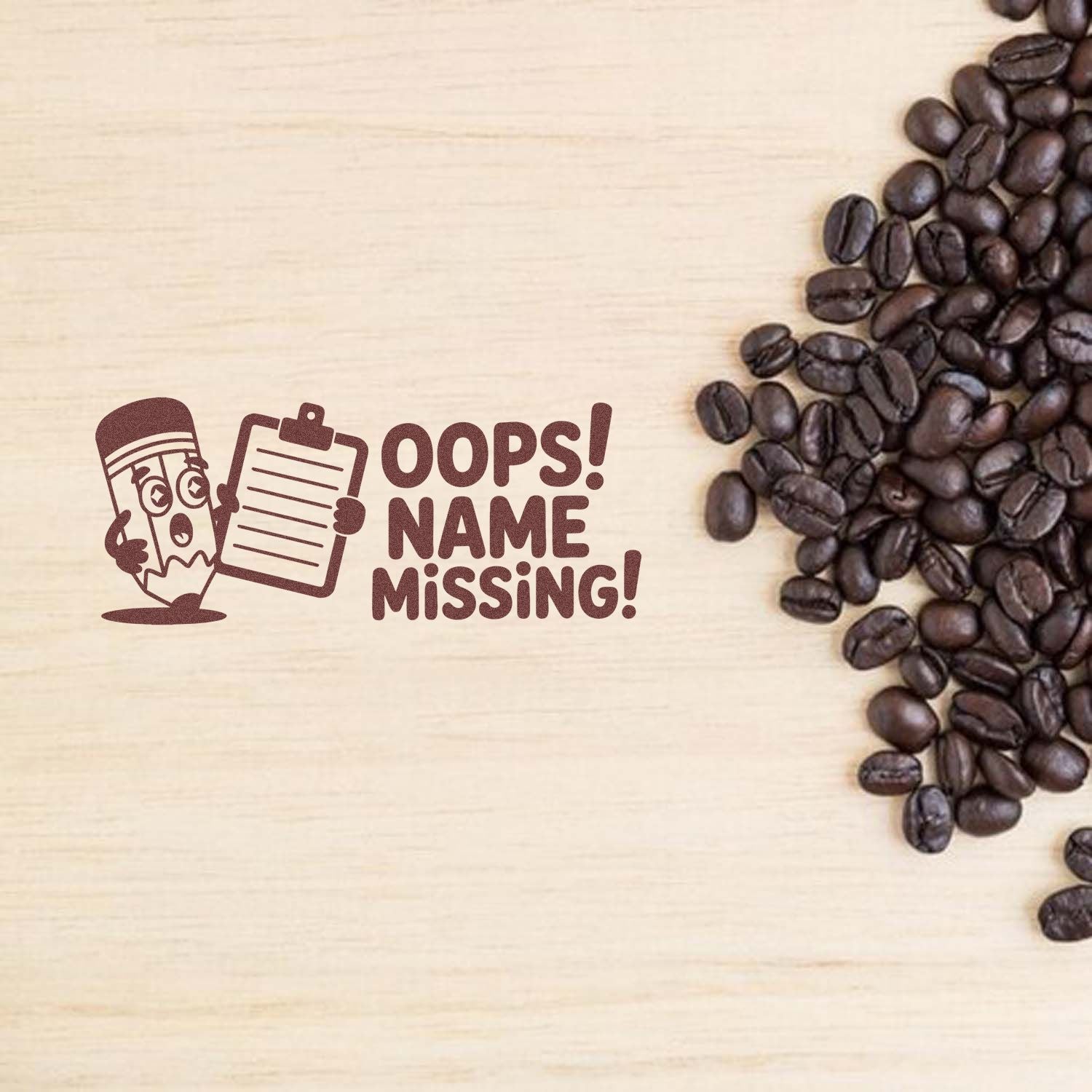 Coffee-themed custom rubber stamp design reading Oops! Name Missing! with pencil and clipboard graphic on wood background.