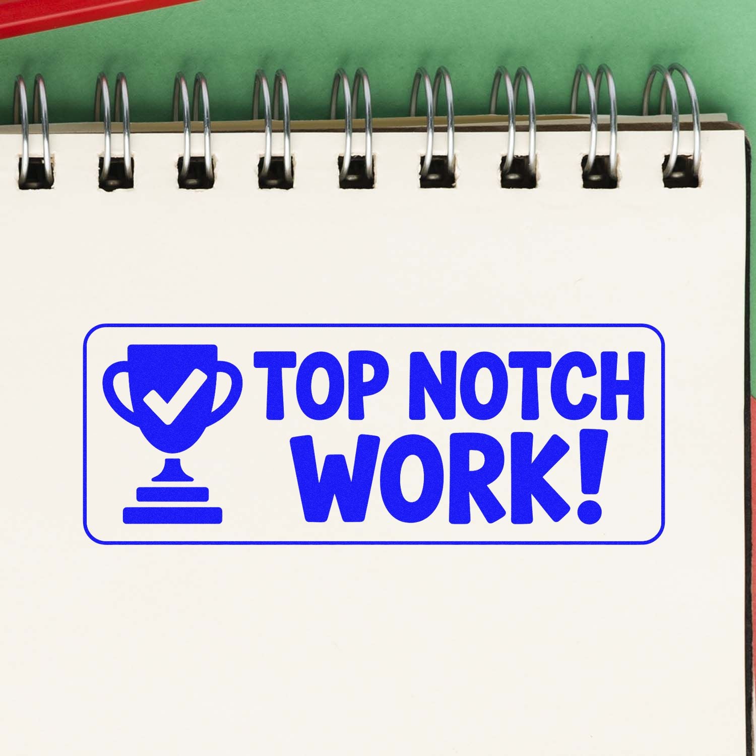Top Notch Work trophy rubber stamp on notebook page for rewarding excellent student or office performance.