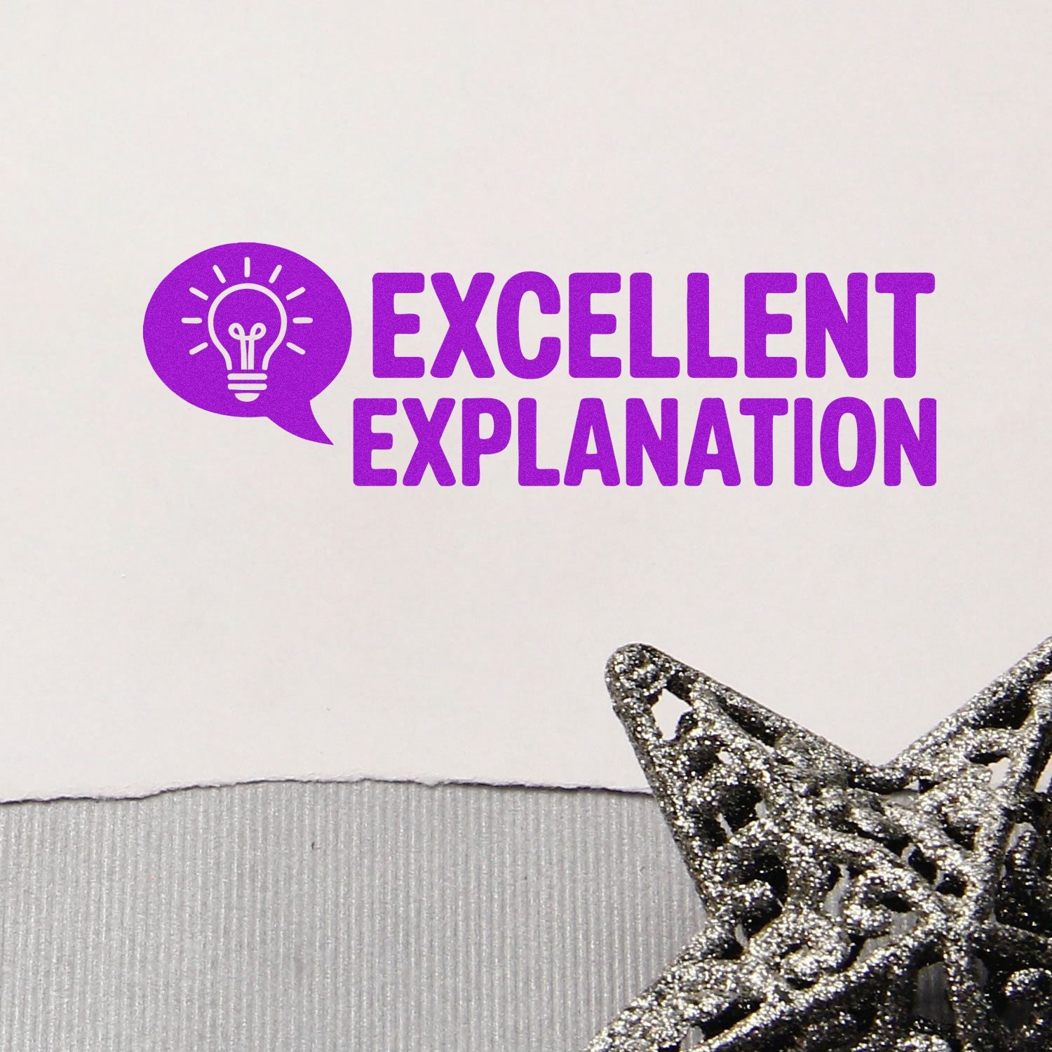 Excellent explanation rubber stamp with lightbulb icon in purple, ideal for teacher feedback and document review.