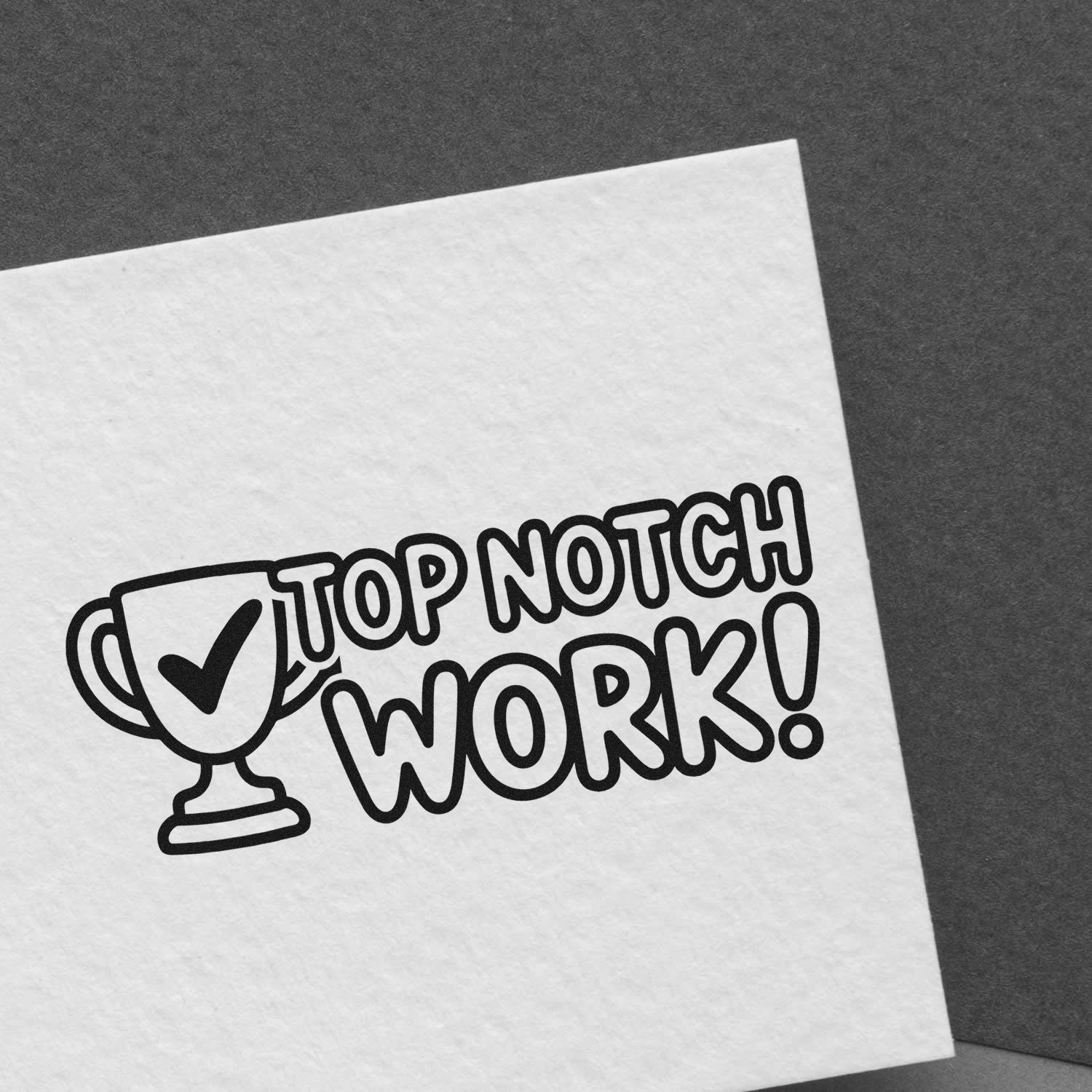 Top Notch Work rubber stamp with trophy checkmark printed on paper for quality approval.
