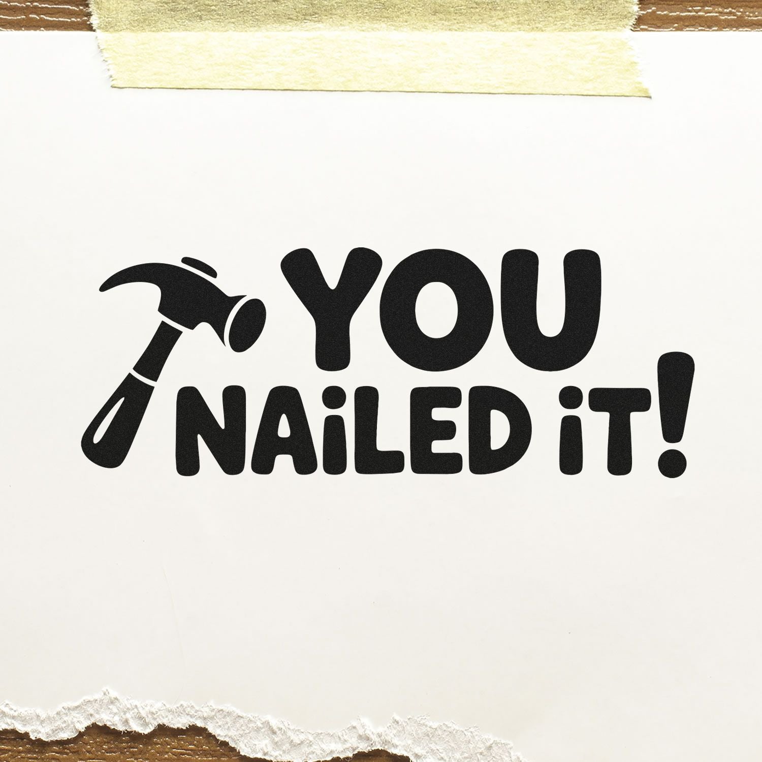 You Nailed It! rubber stamp with hammer icon, ideal for congratulatory crafts, packaging, and office use.