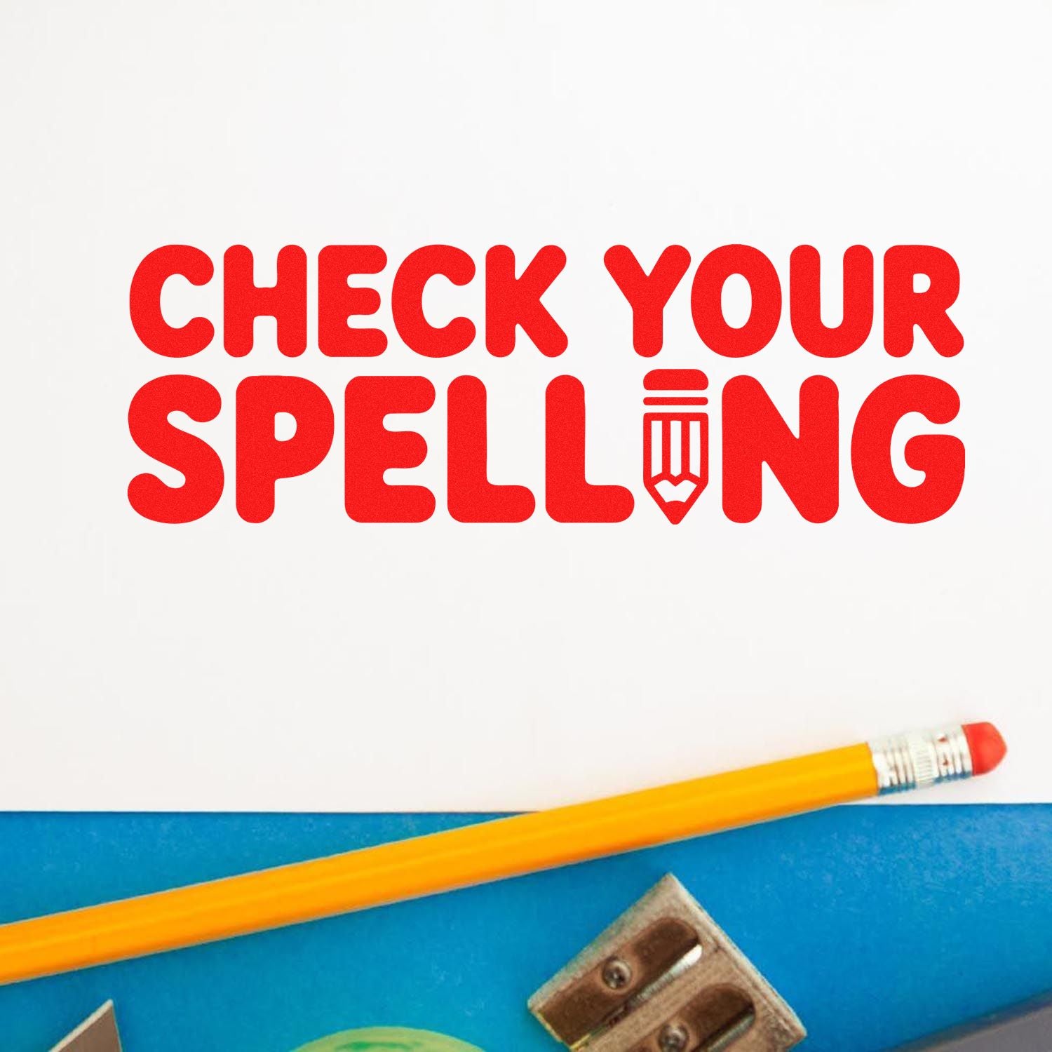 Red Check Your Spelling rubber stamp design with pencil icon for proofreading, classroom, and office use.